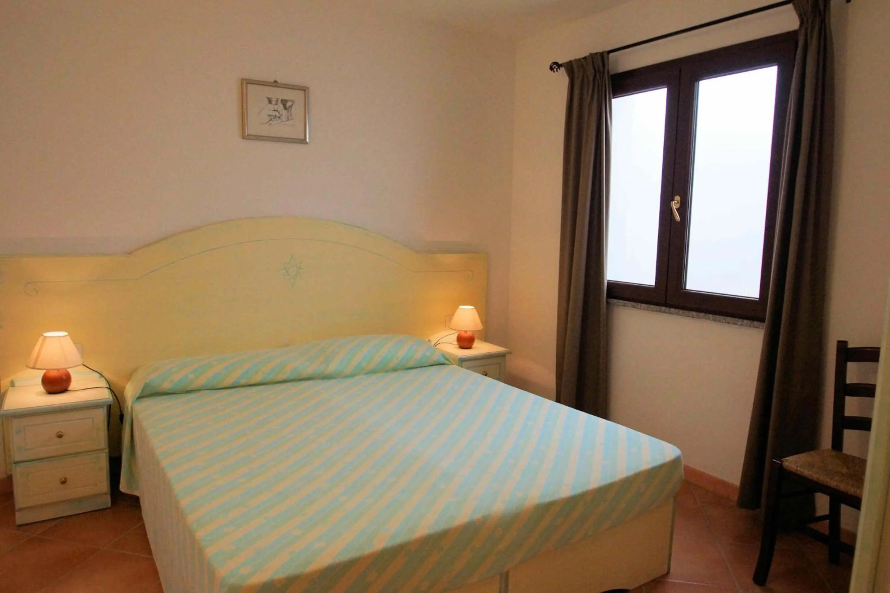 Bedroom, Bed in Sa Fiorida Appartamenti