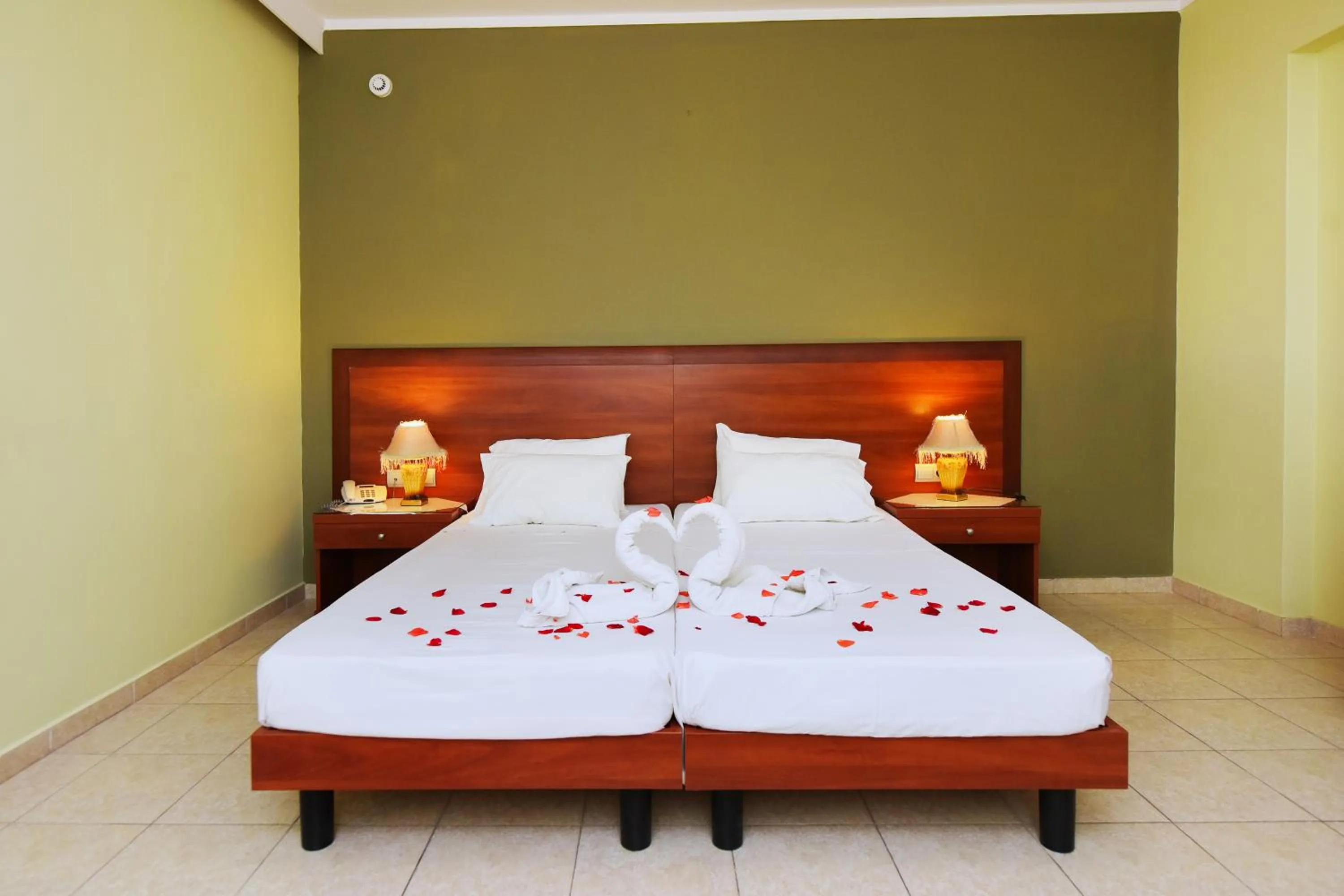 Bed in Esmeralda Hotel