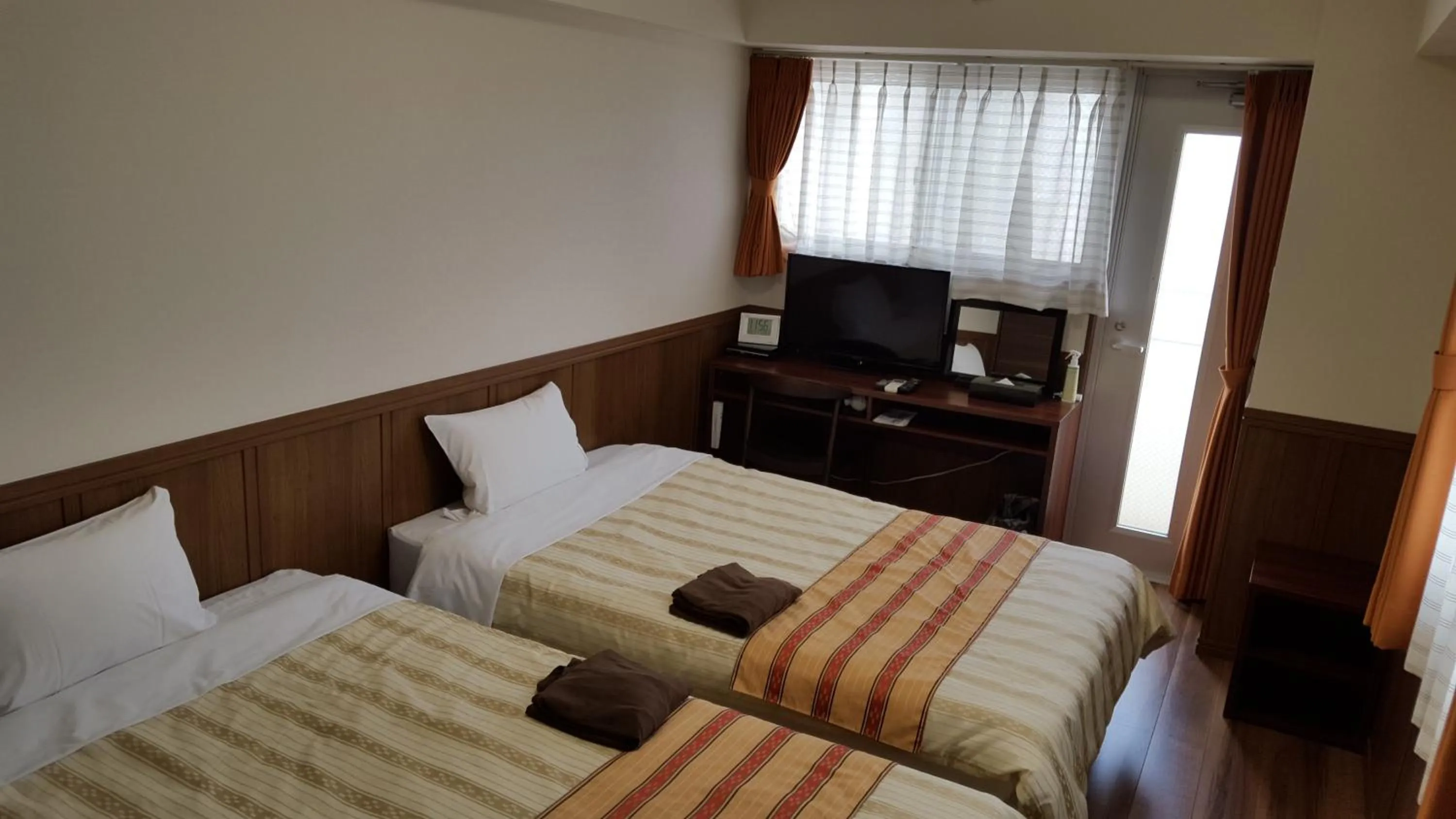 Bed in Hotel Peacely In Miyakojima Nexus