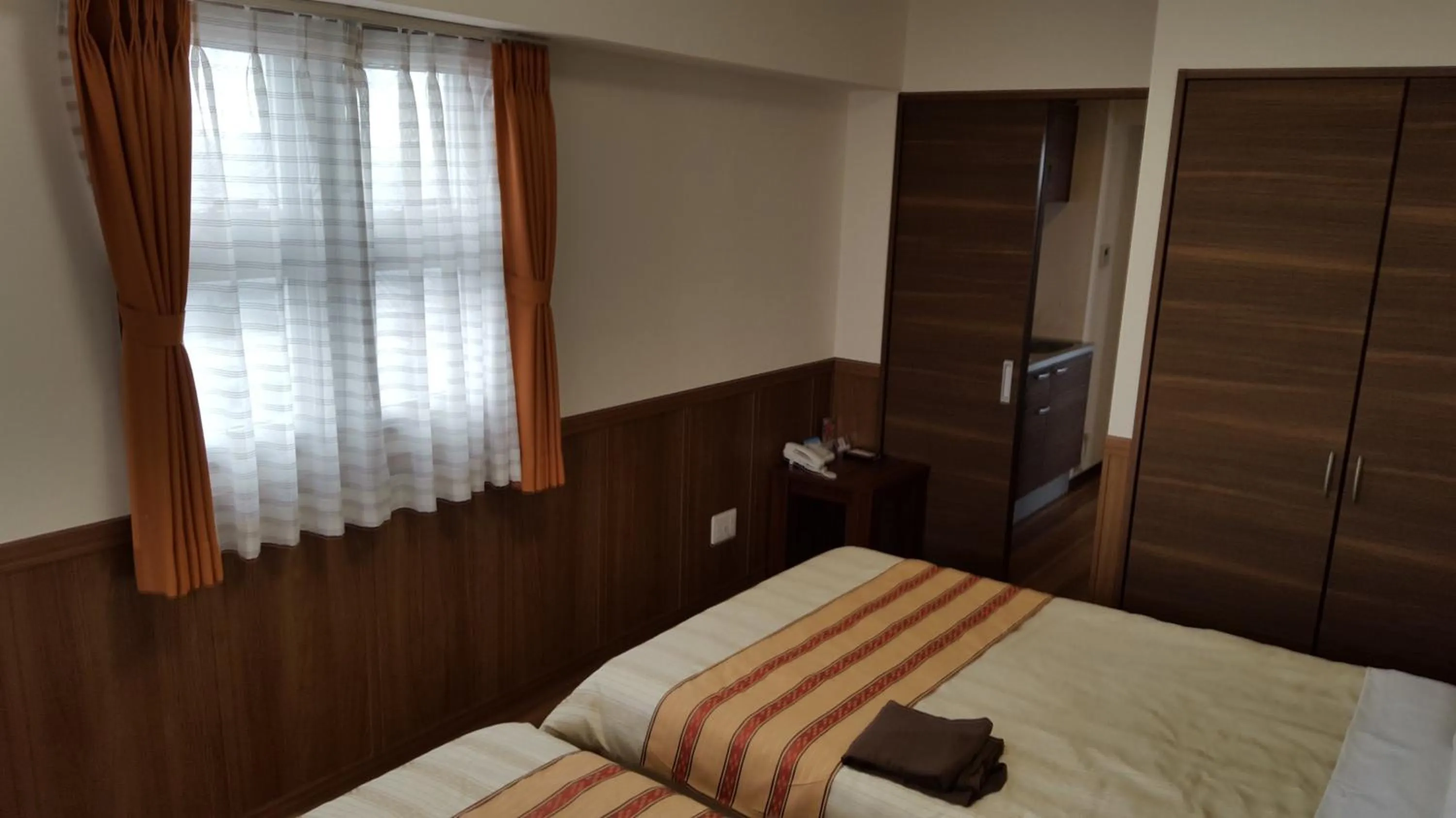 Bed in Hotel Peacely In Miyakojima Nexus