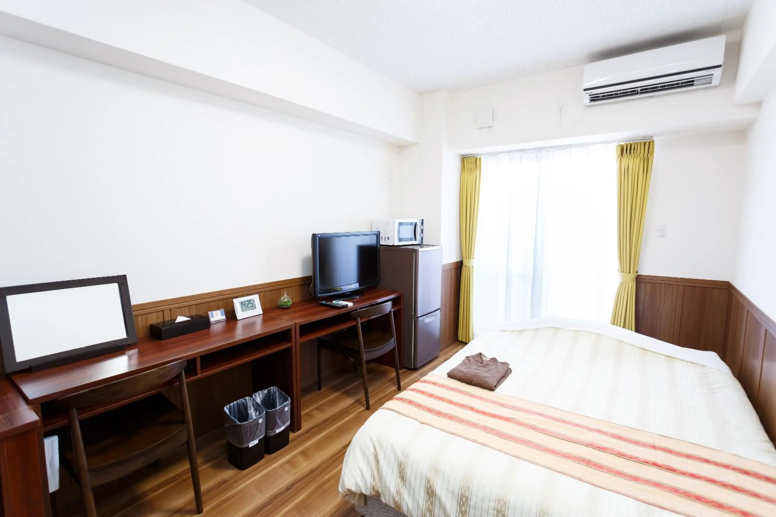 Bed in Hotel Peacely In Miyakojima Nexus