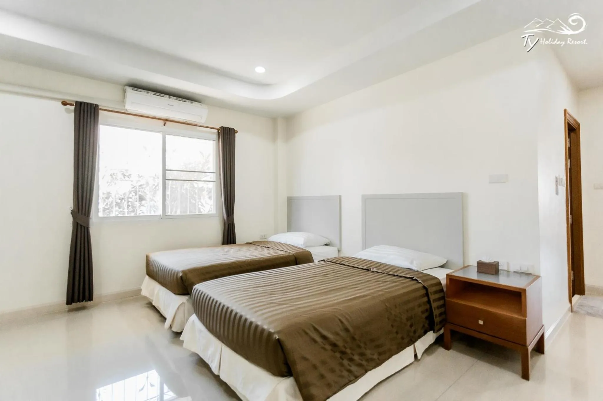 Bed in TY Holiday Resort