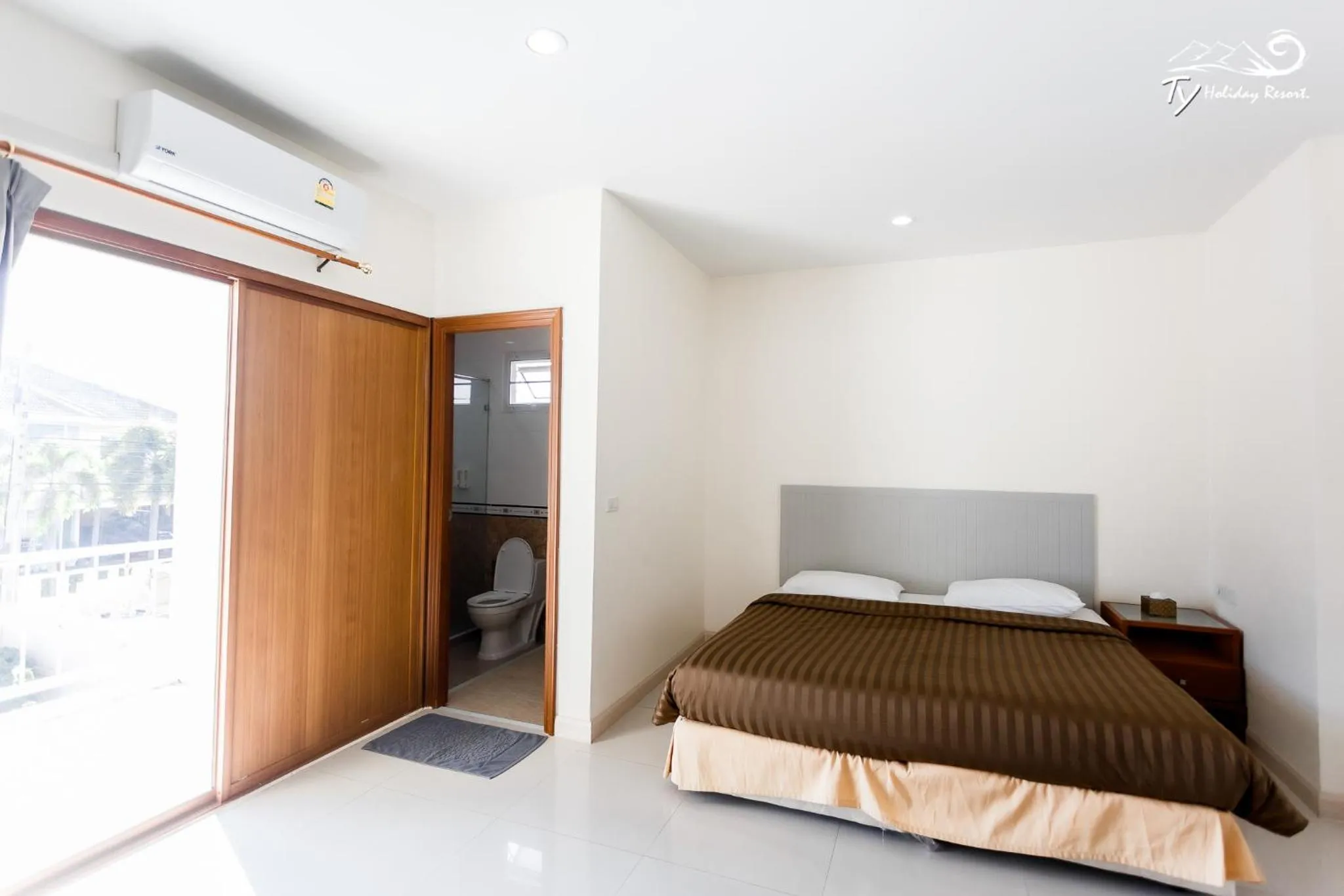 Bed in TY Holiday Resort