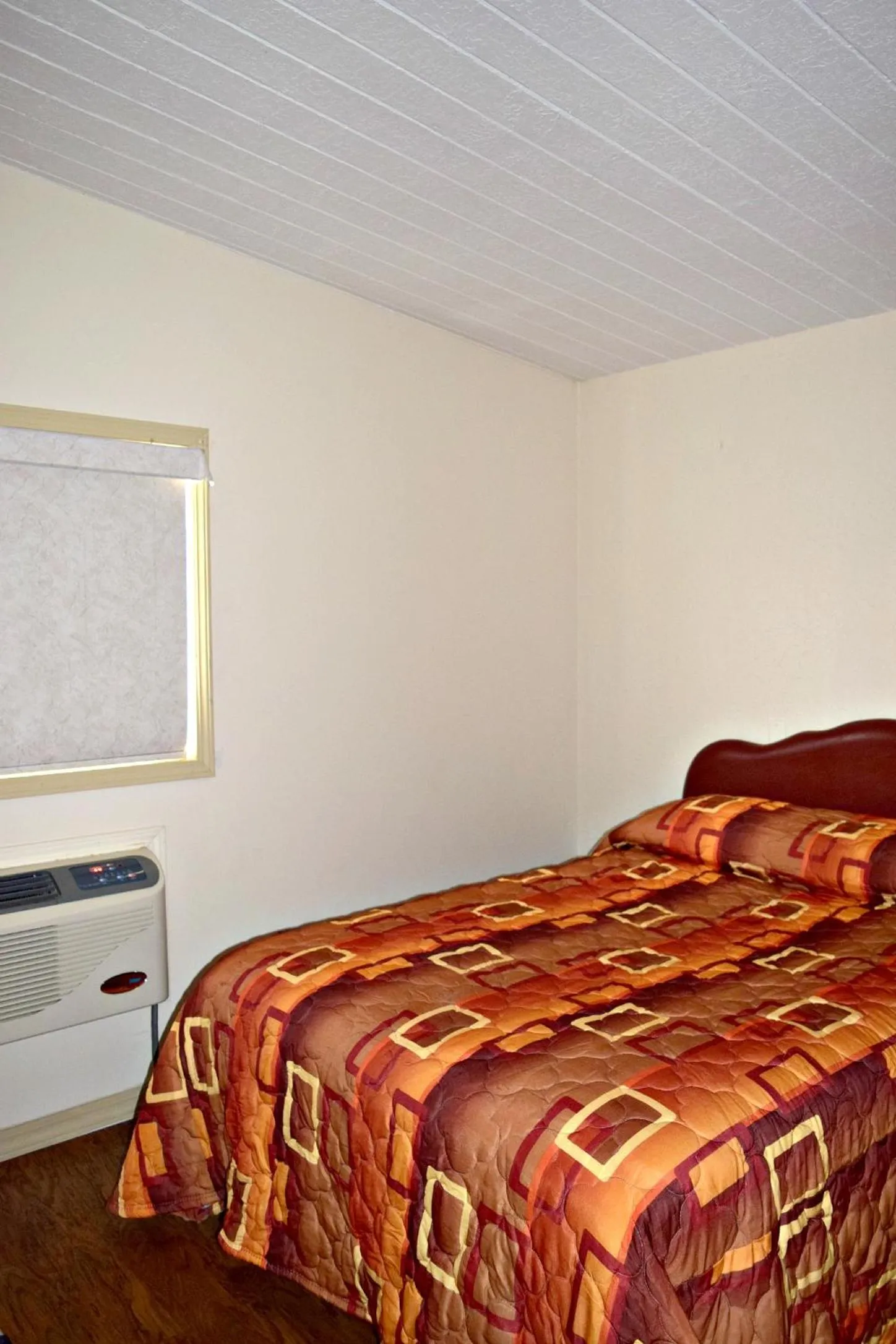 Bed in Centre Suite Inns Motel