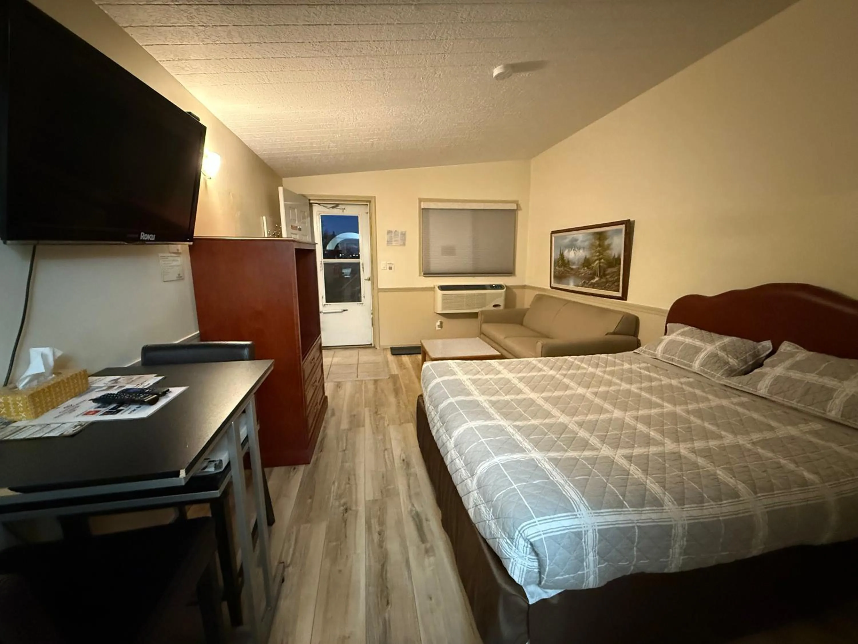 Bed in Centre Suite Inns Motel