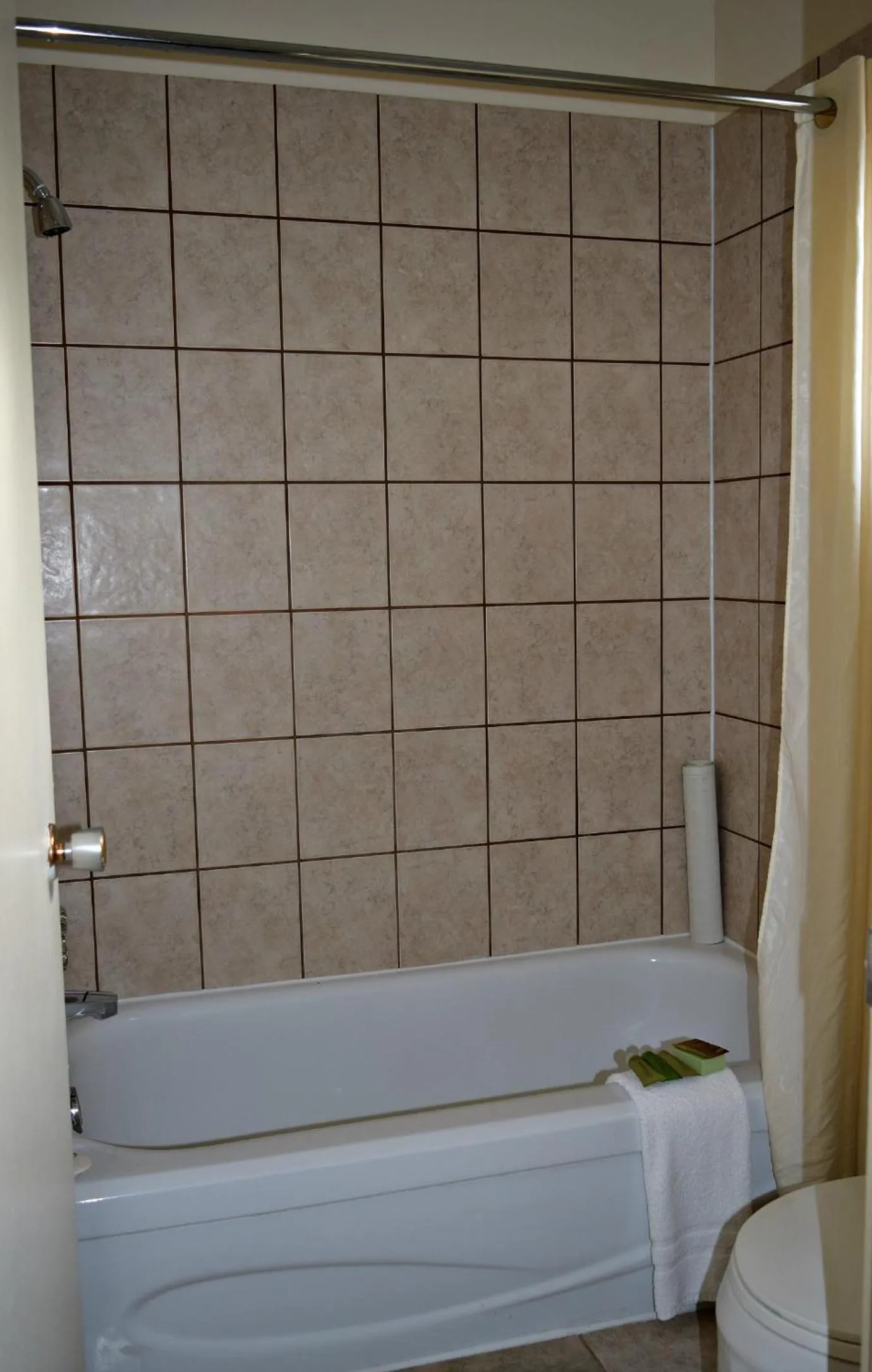 Bed in Centre Suite Inns Motel