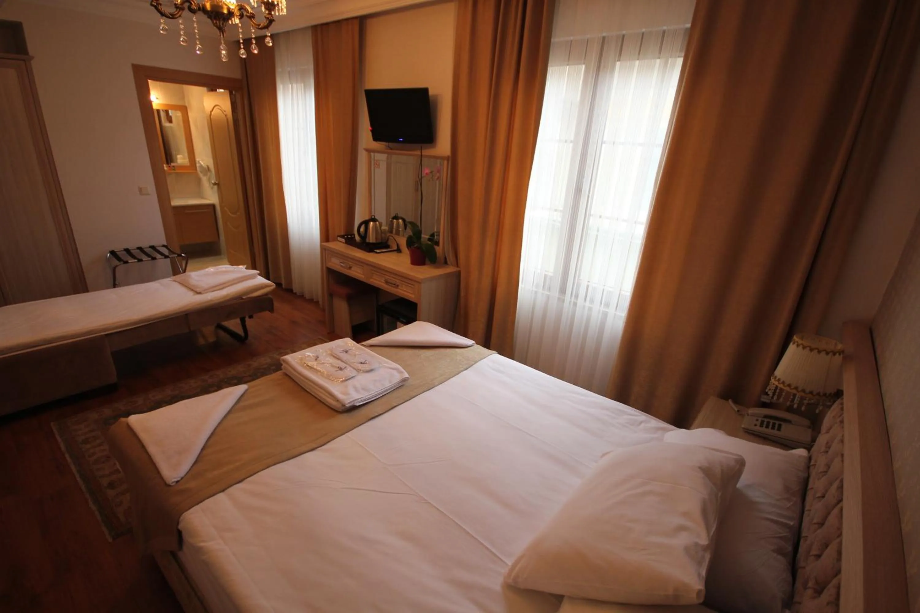 Bed in Sultans Royal Hotel