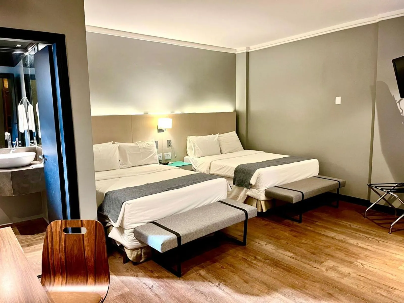 Bed in Oasis Plaza Hotel