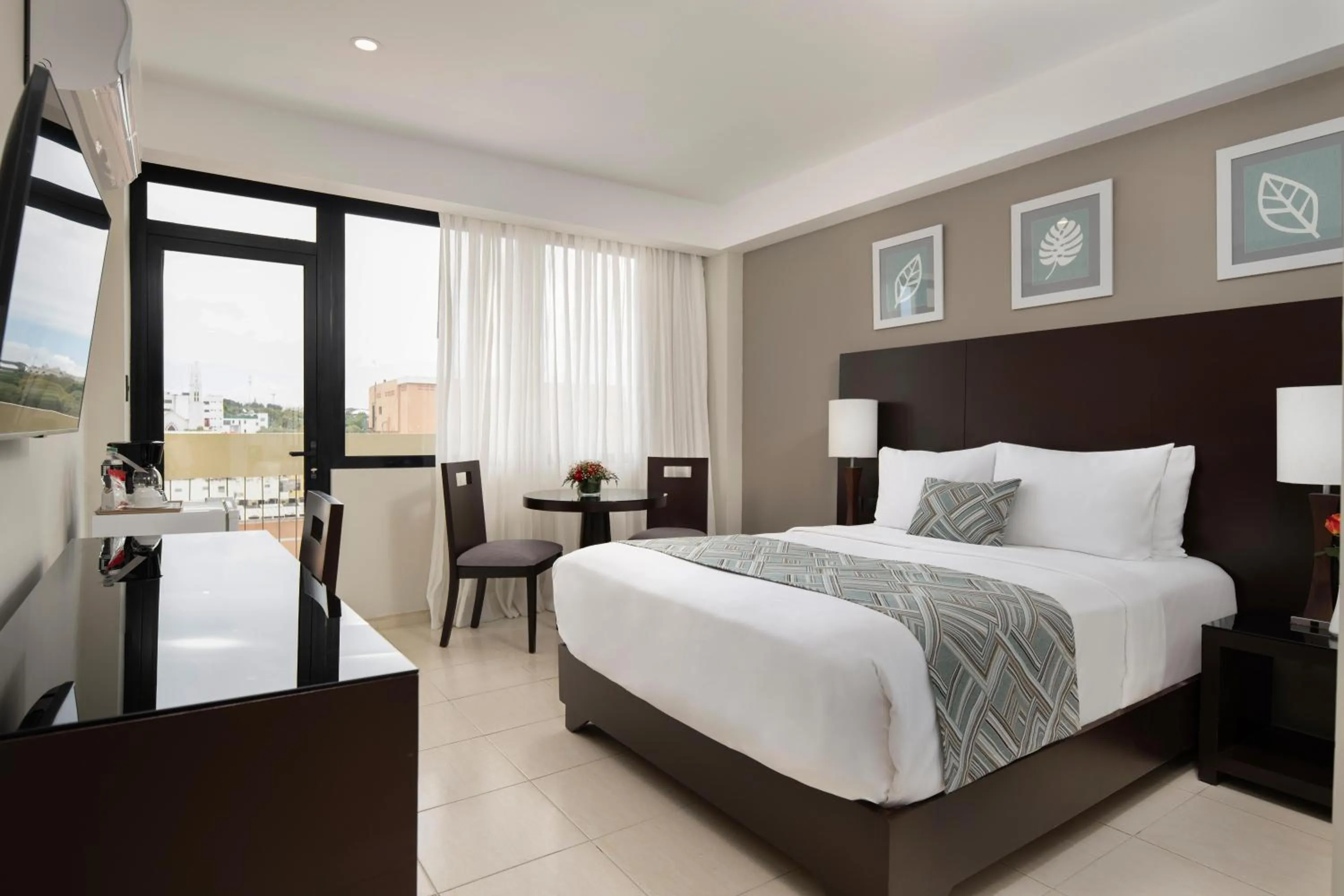 Photo of the whole room, Bed in Hodelpa Centro Plaza