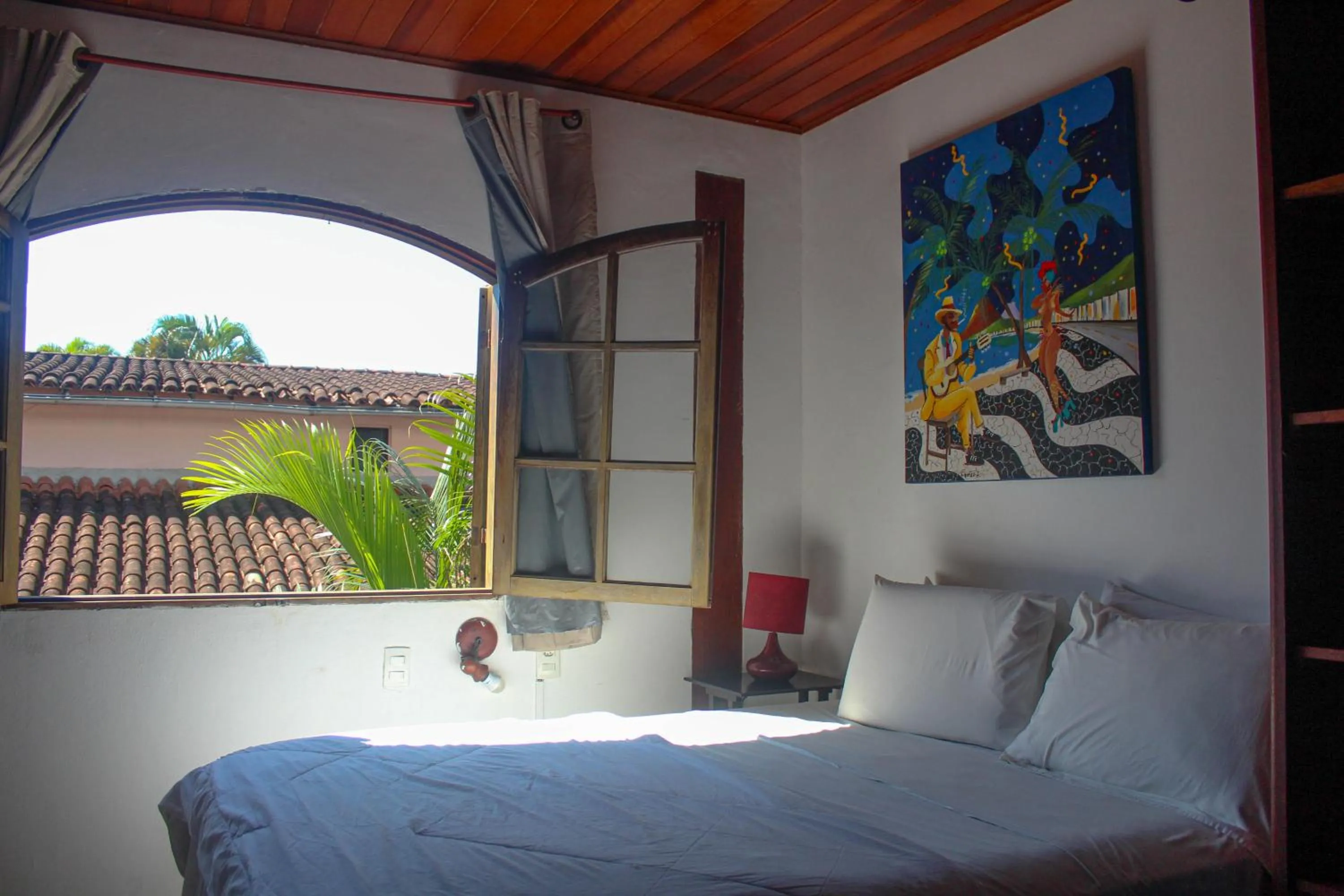 View (from property/room), Bed in Pousada Tropicana