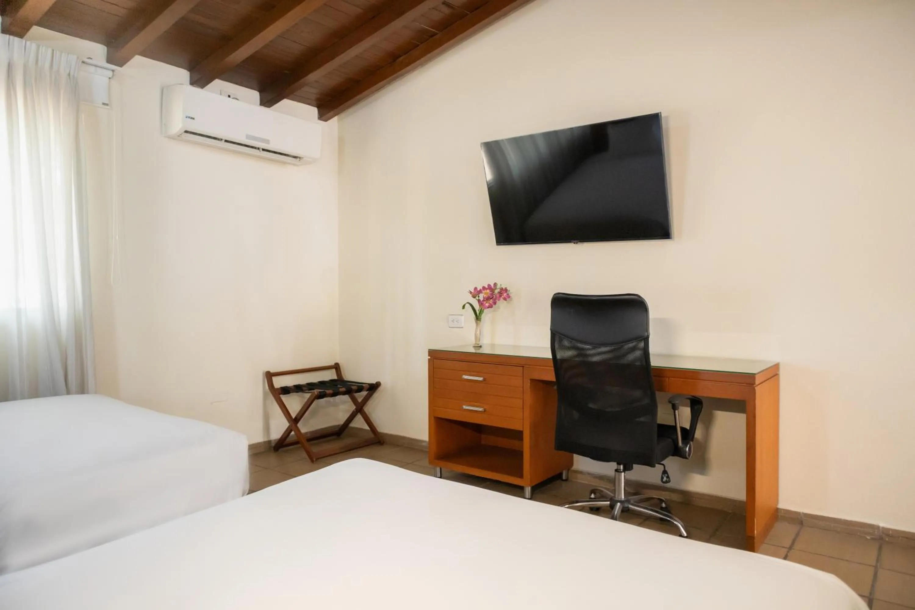 Photo of the whole room, Bed in Hotel Faranda Bolivar Cucuta, a member of Radisson Individuals