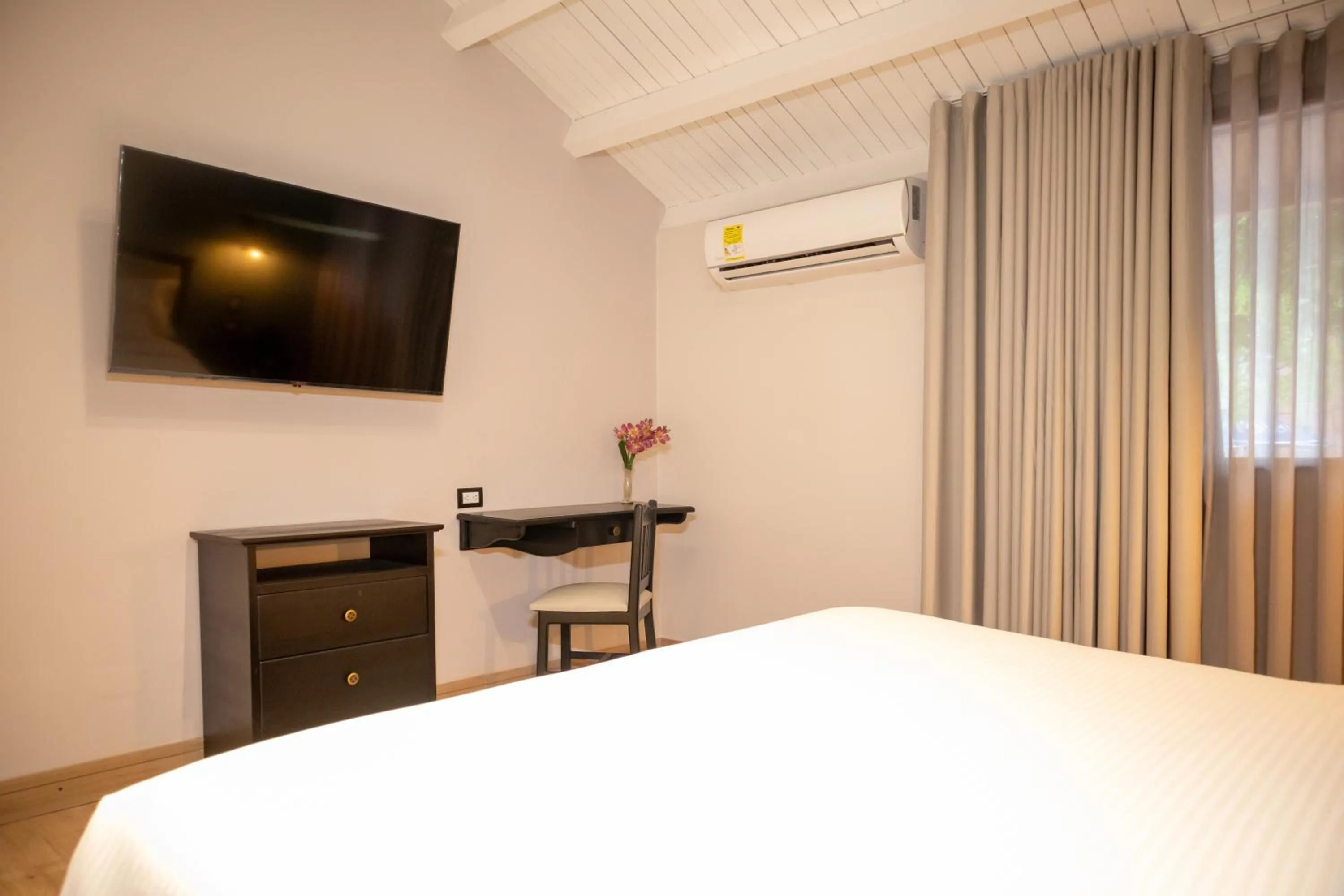 Bed in Hotel Faranda Bolivar Cucuta, a member of Radisson Individuals