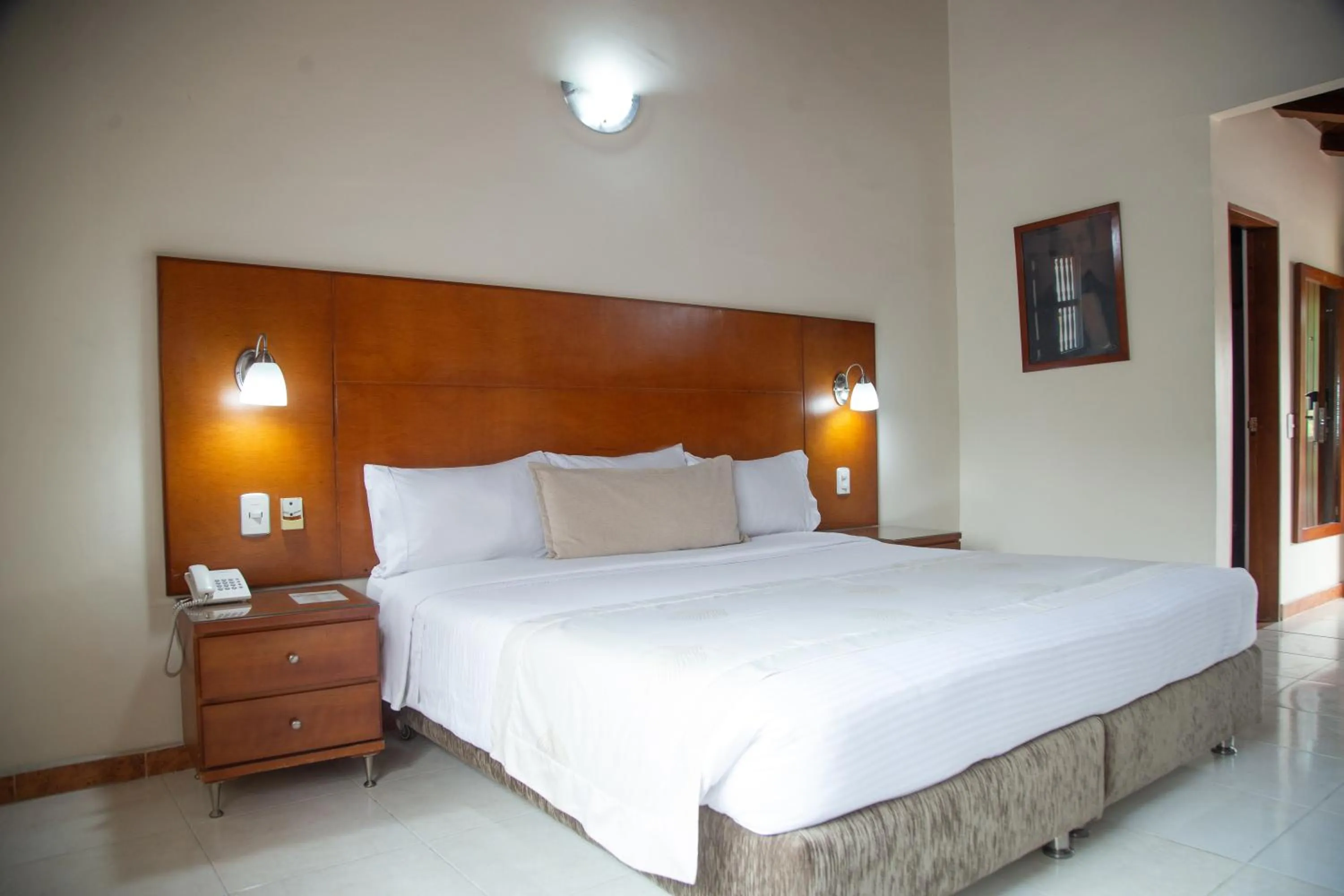 Bed in Hotel Faranda Bolivar Cucuta, a member of Radisson Individuals