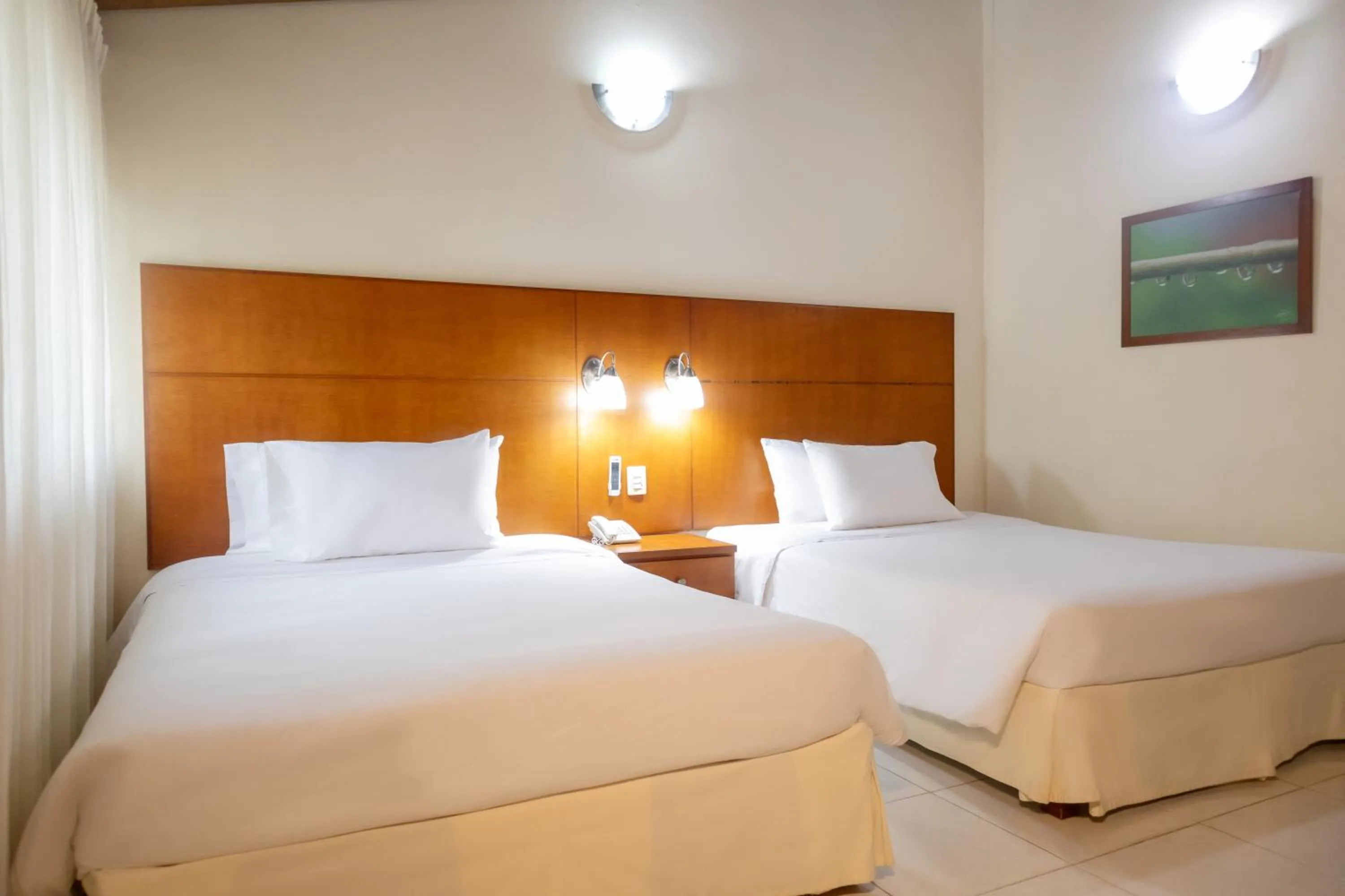 Bed in Hotel Faranda Bolivar Cucuta, a member of Radisson Individuals
