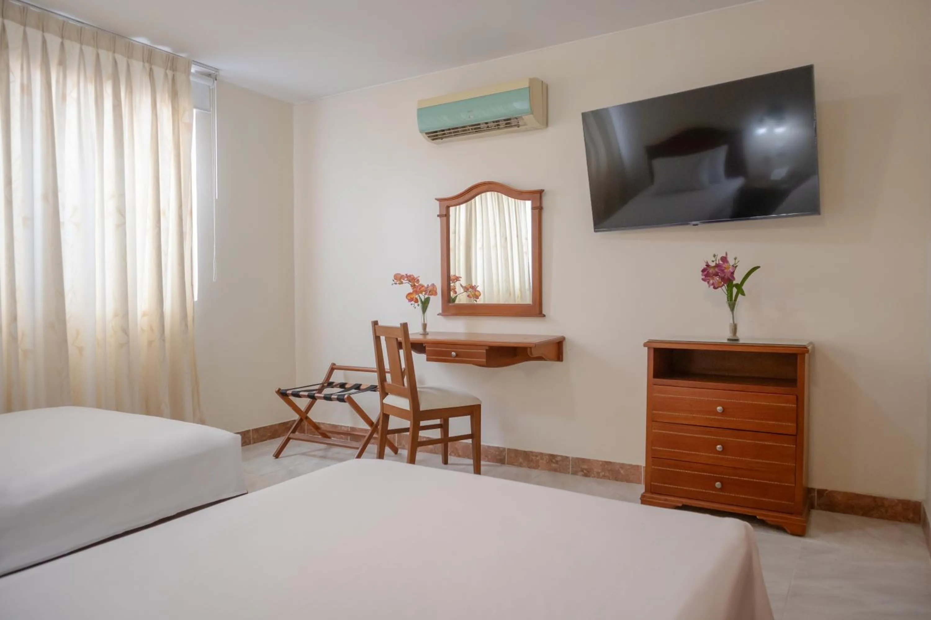Bed in Hotel Faranda Bolivar Cucuta, a member of Radisson Individuals