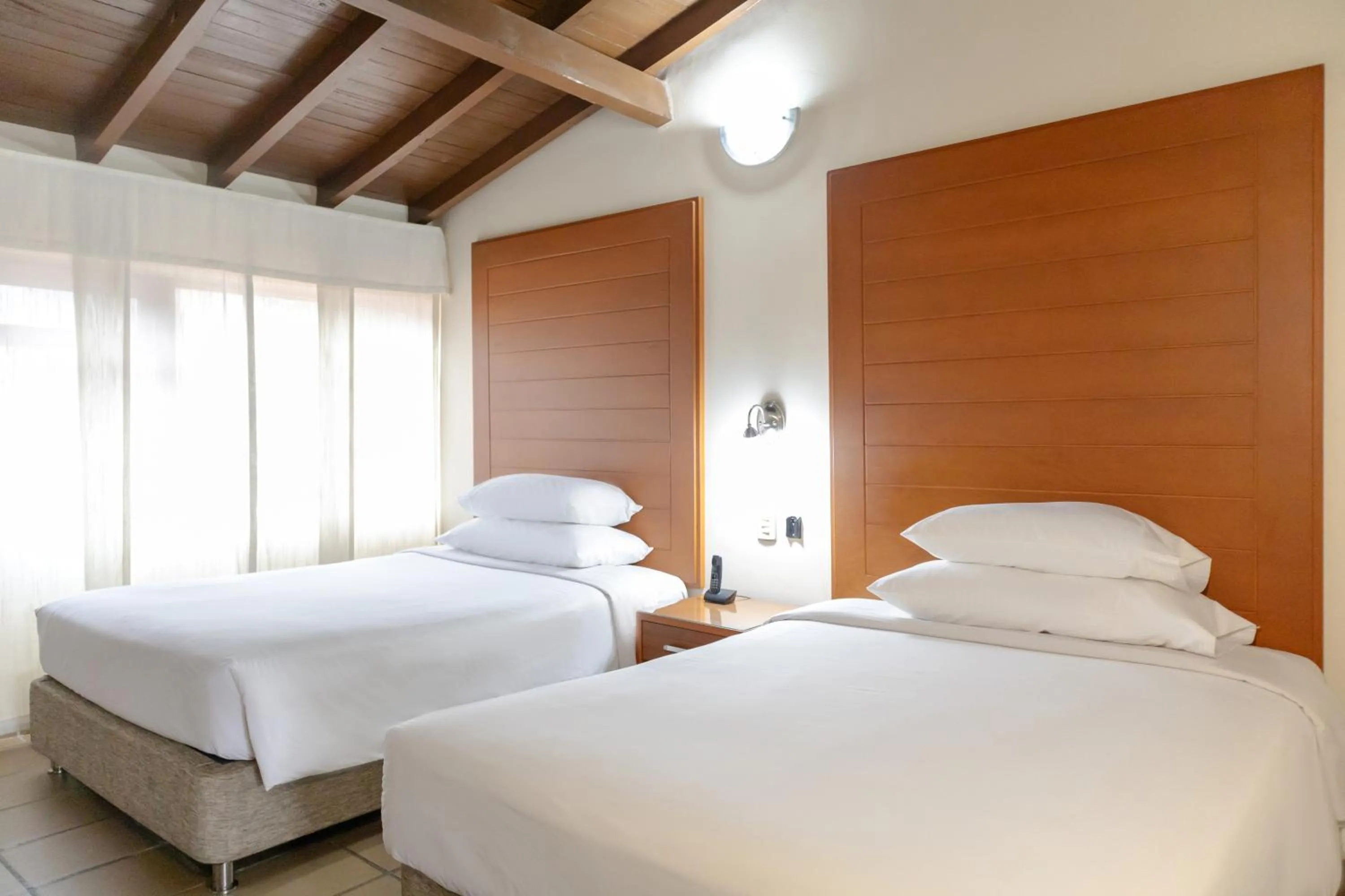 Bed in Hotel Faranda Bolivar Cucuta, a member of Radisson Individuals