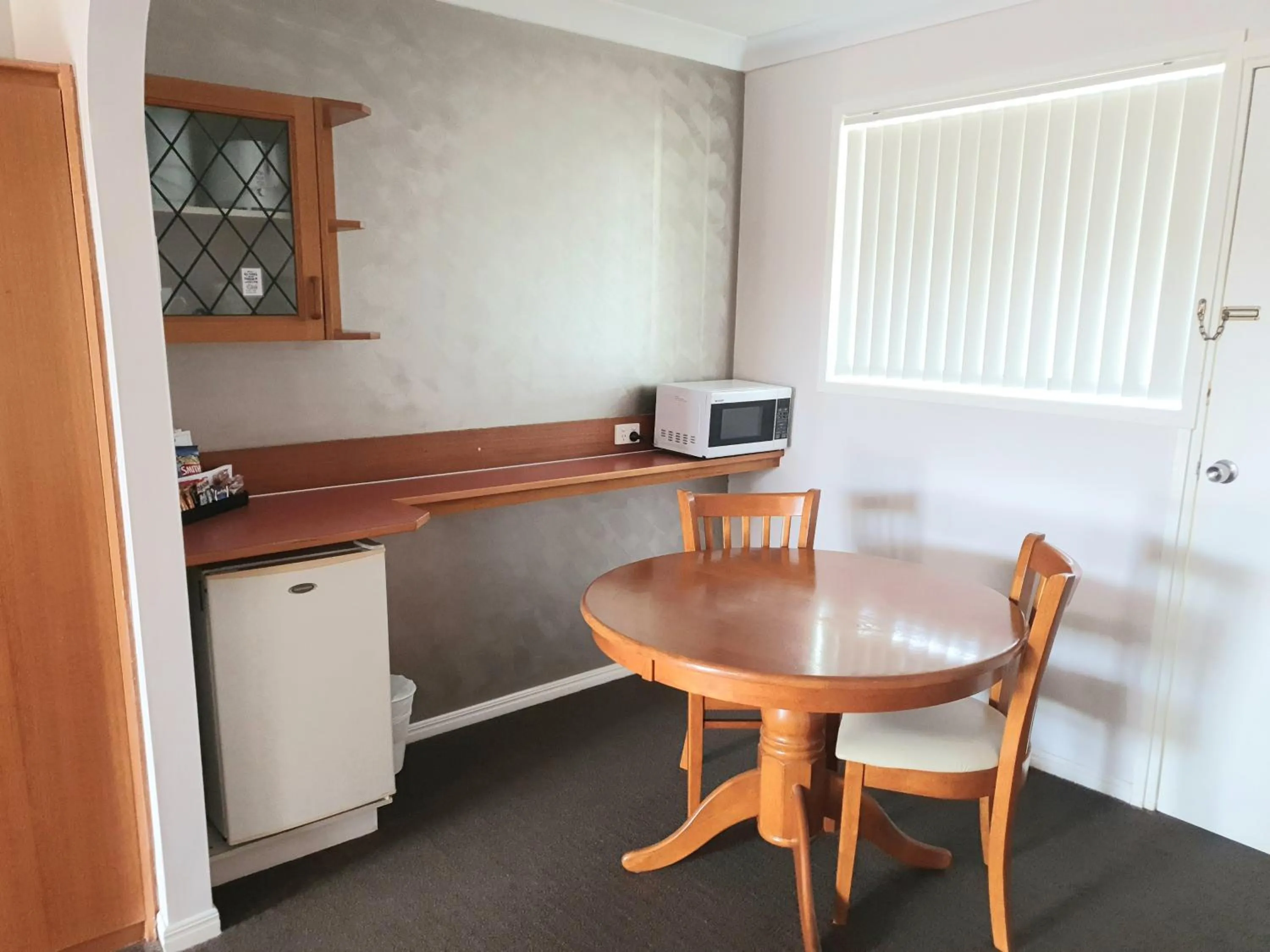 Kitchen or kitchenette in McNevins Maryborough Motel