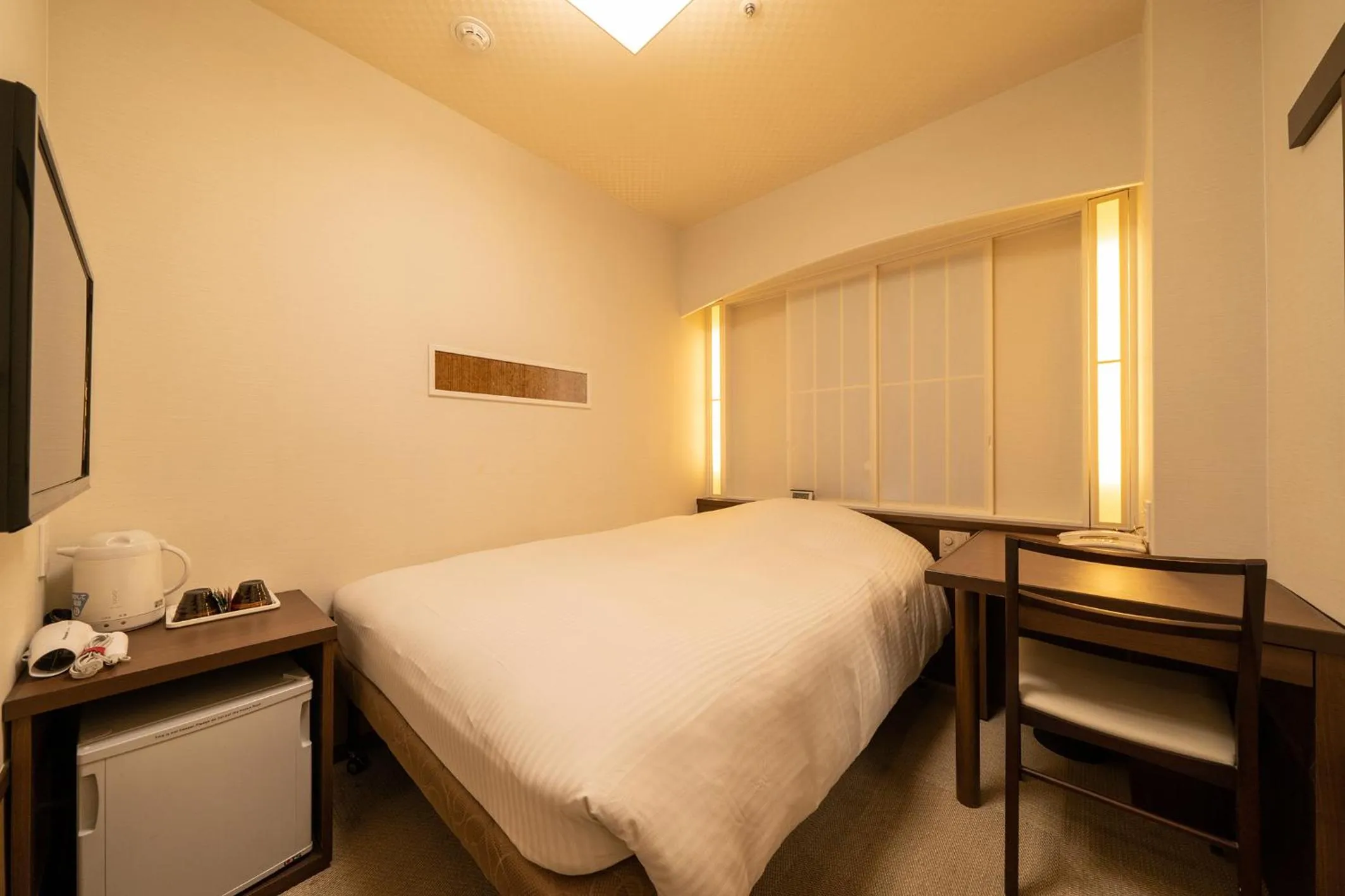 Photo of the whole room, Bed in Hotel Sunlite Shinjuku