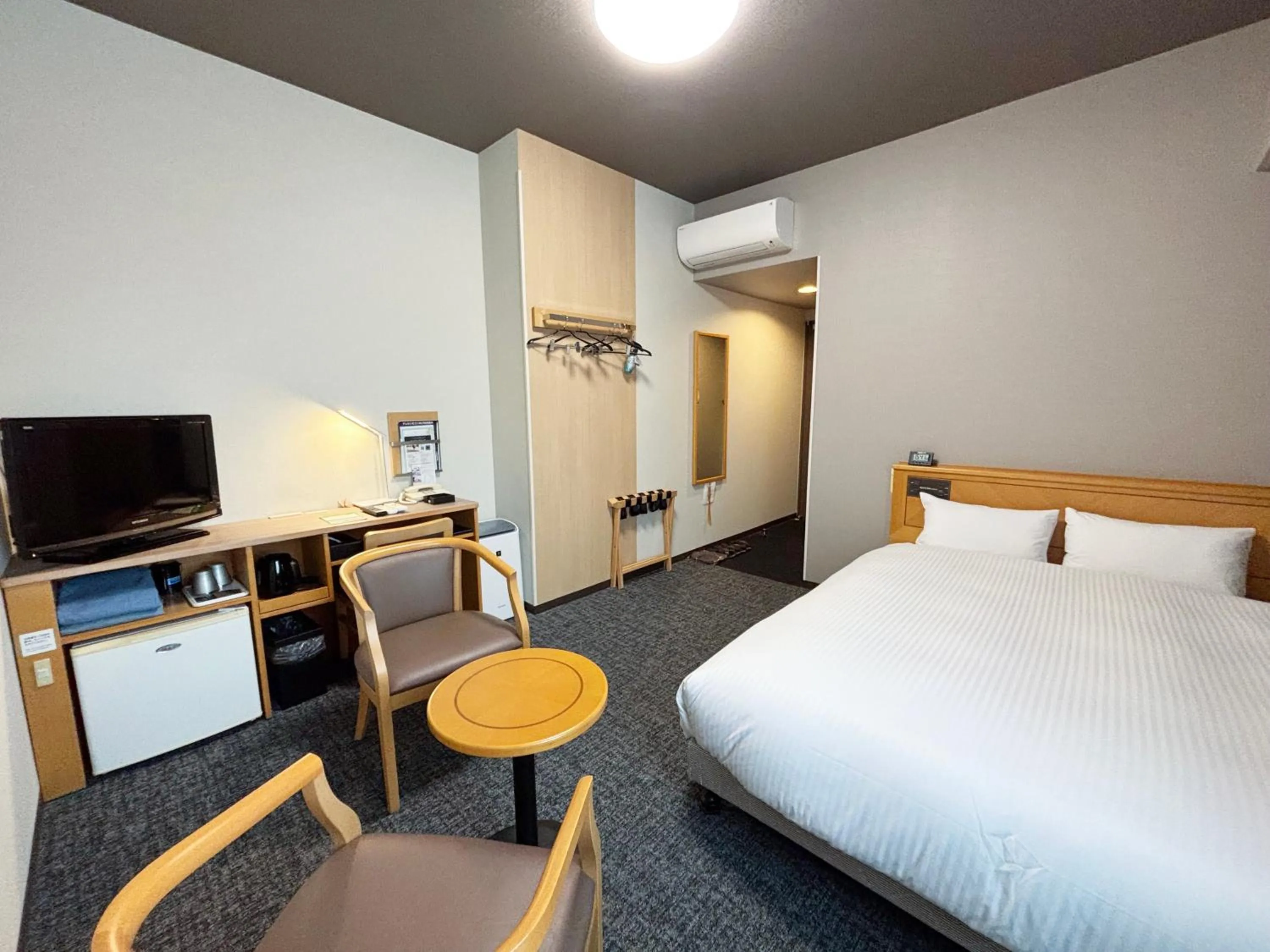 Photo of the whole room, Bed in Hotel Route-Inn Nahatomariko