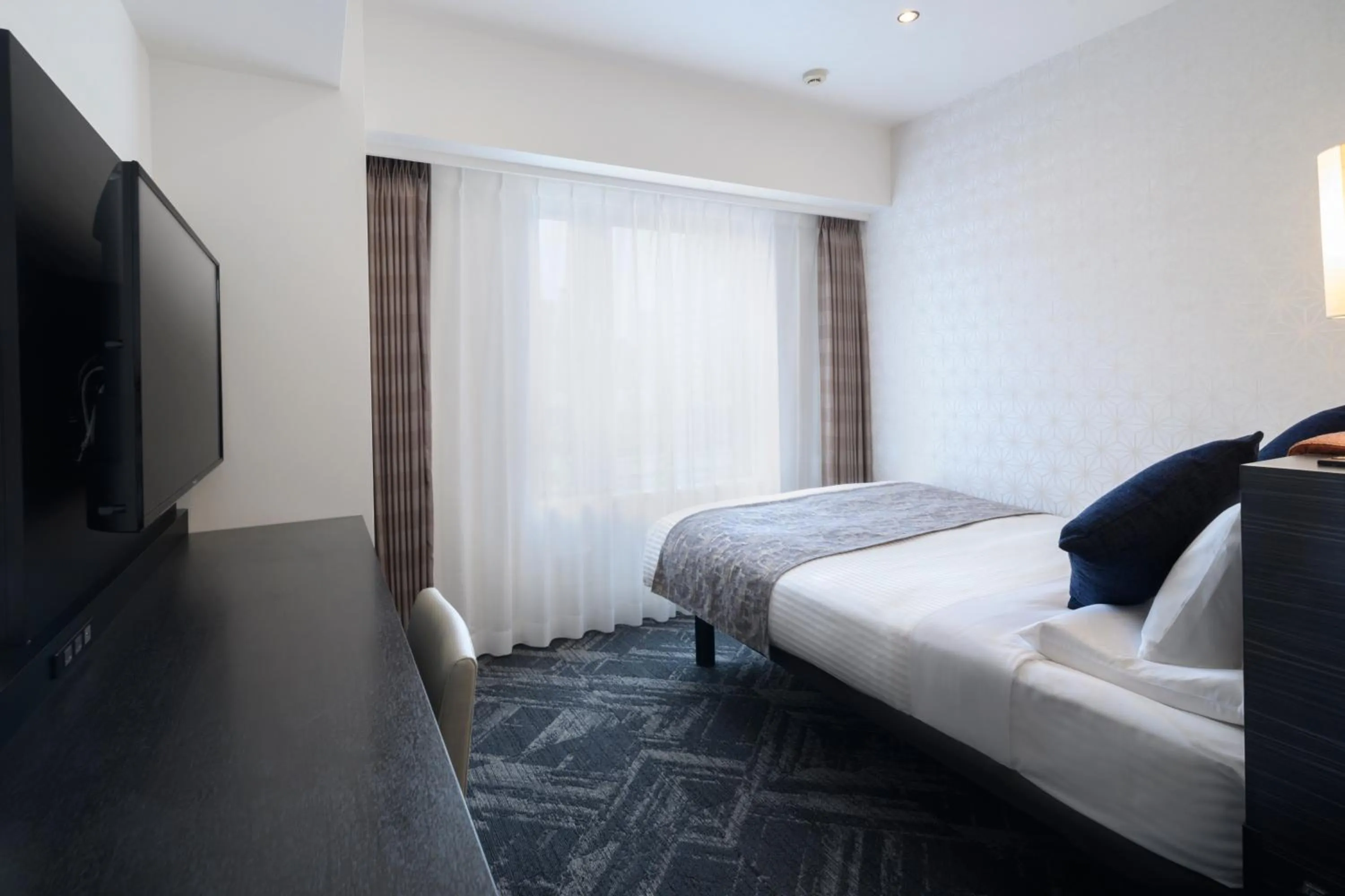 Bed in HOTEL MYSTAYS Hamamatsucho