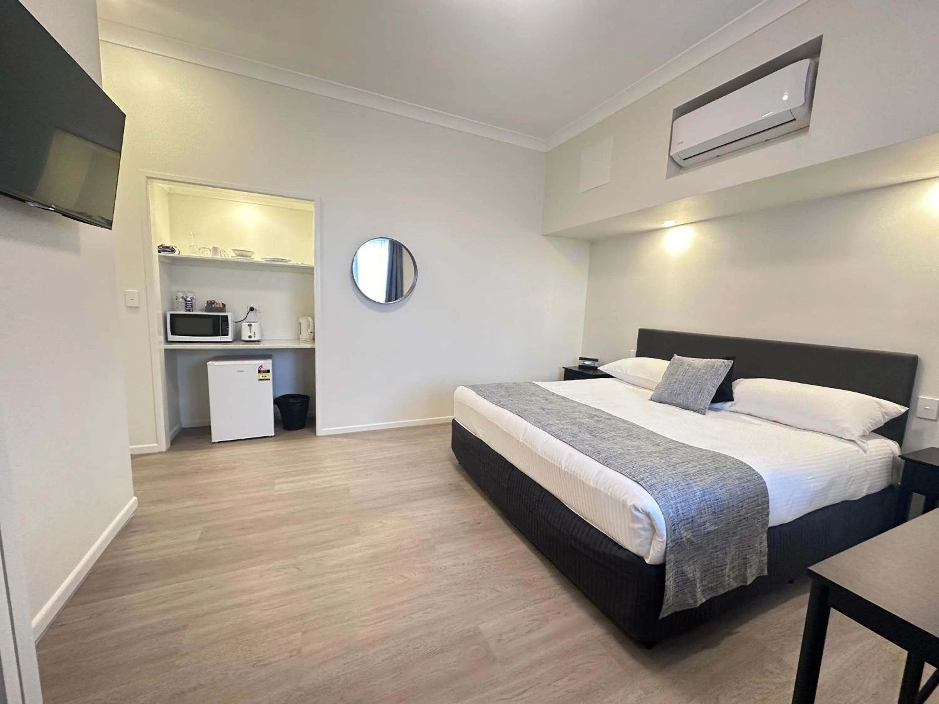 Bed in McNevins Logan Park Motel