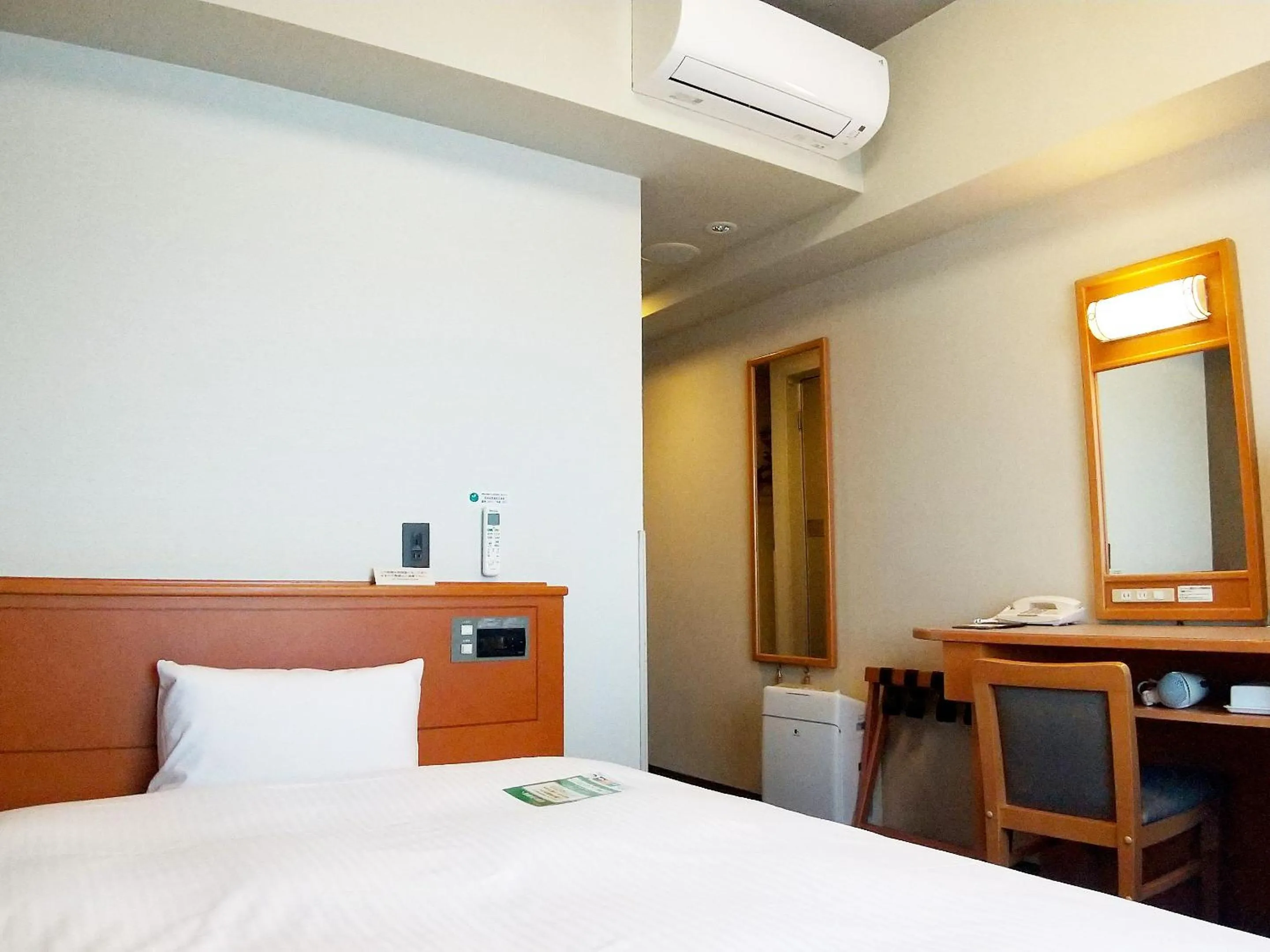 Photo of the whole room, Bed in Hotel Route-Inn Niigata Kencho-minami