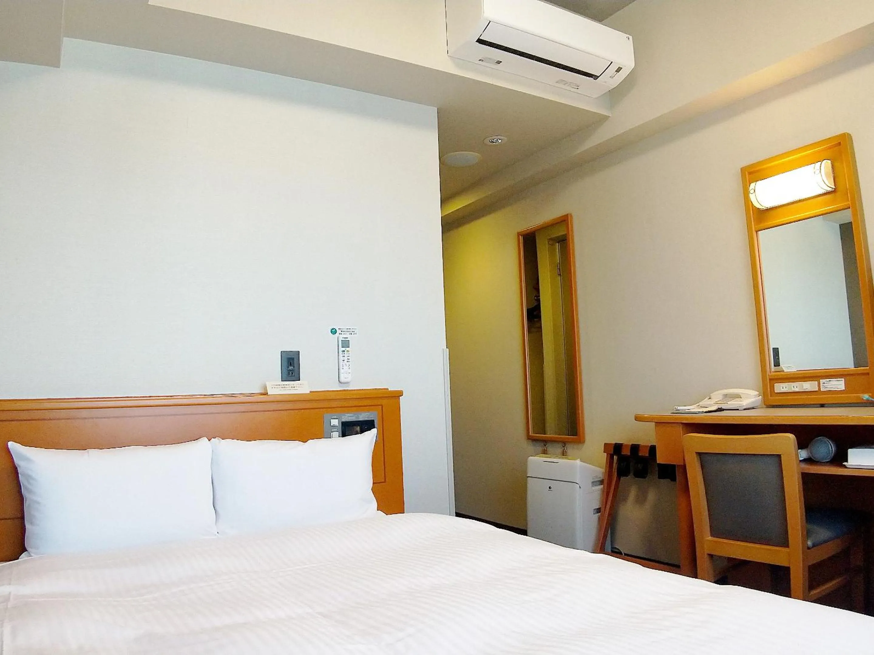 Photo of the whole room, Bed in Hotel Route-Inn Niigata Kencho-minami