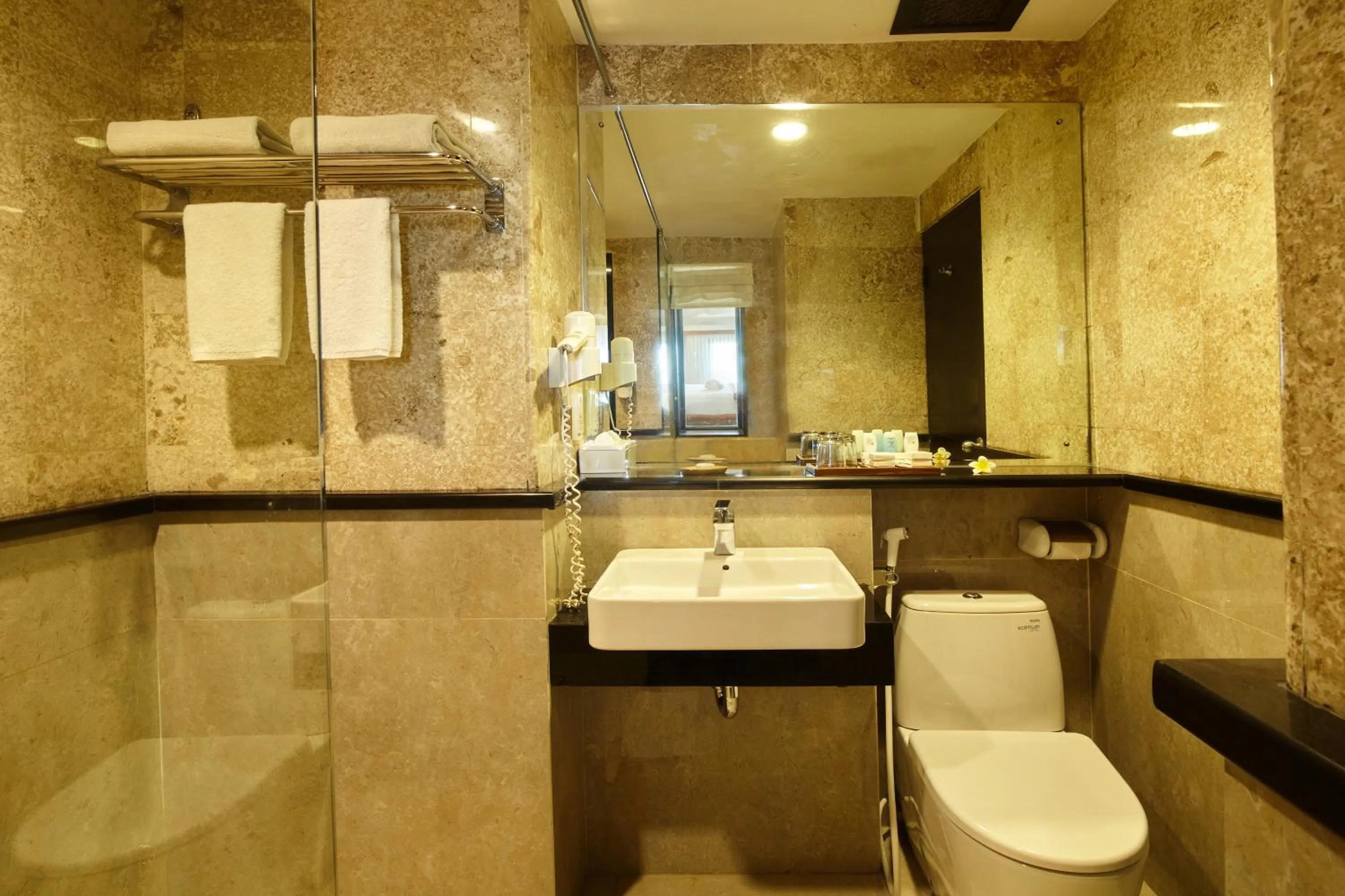 Bathroom in The Lokha Legian Resort & Spa