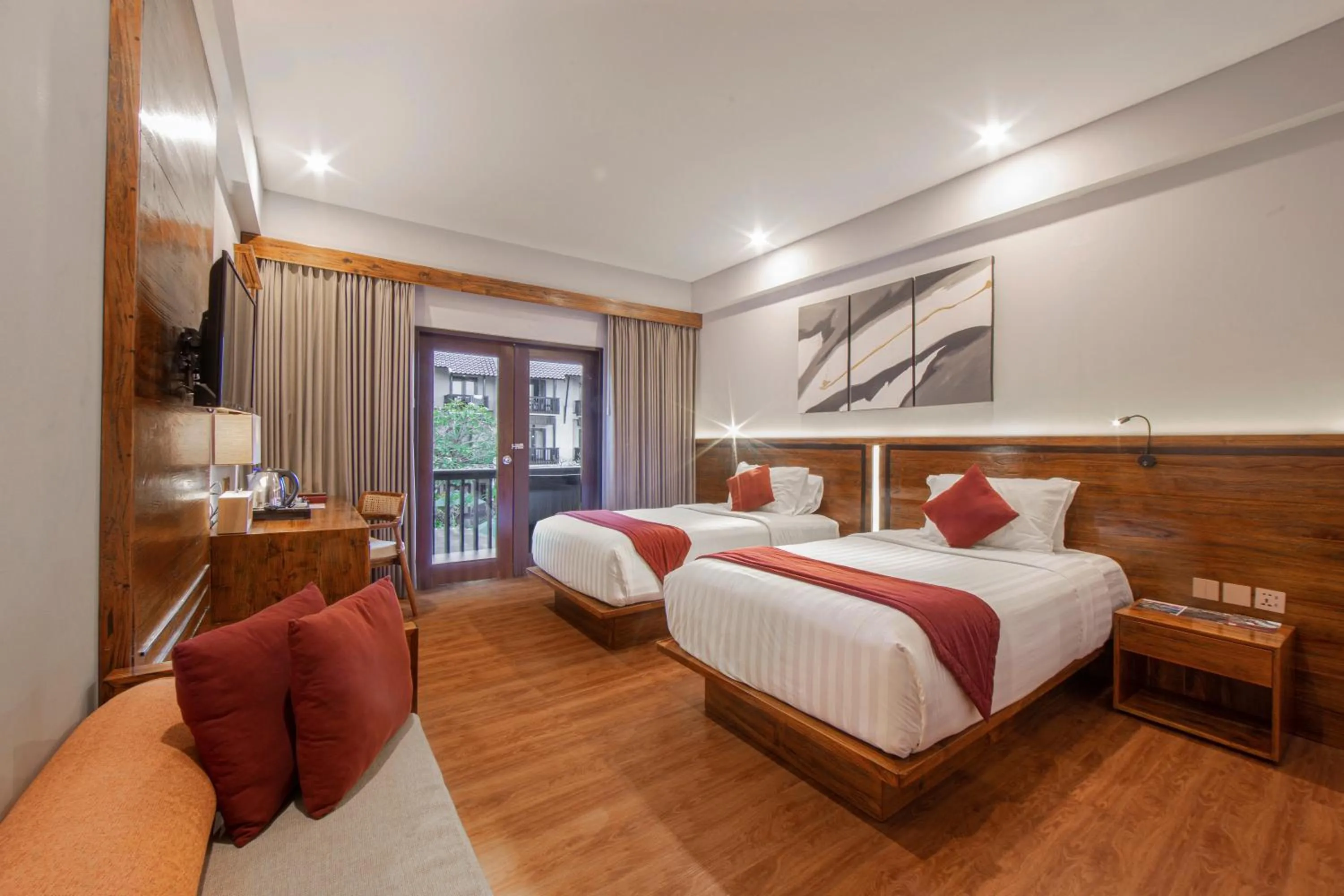 Bed in The Lokha Legian Resort & Spa
