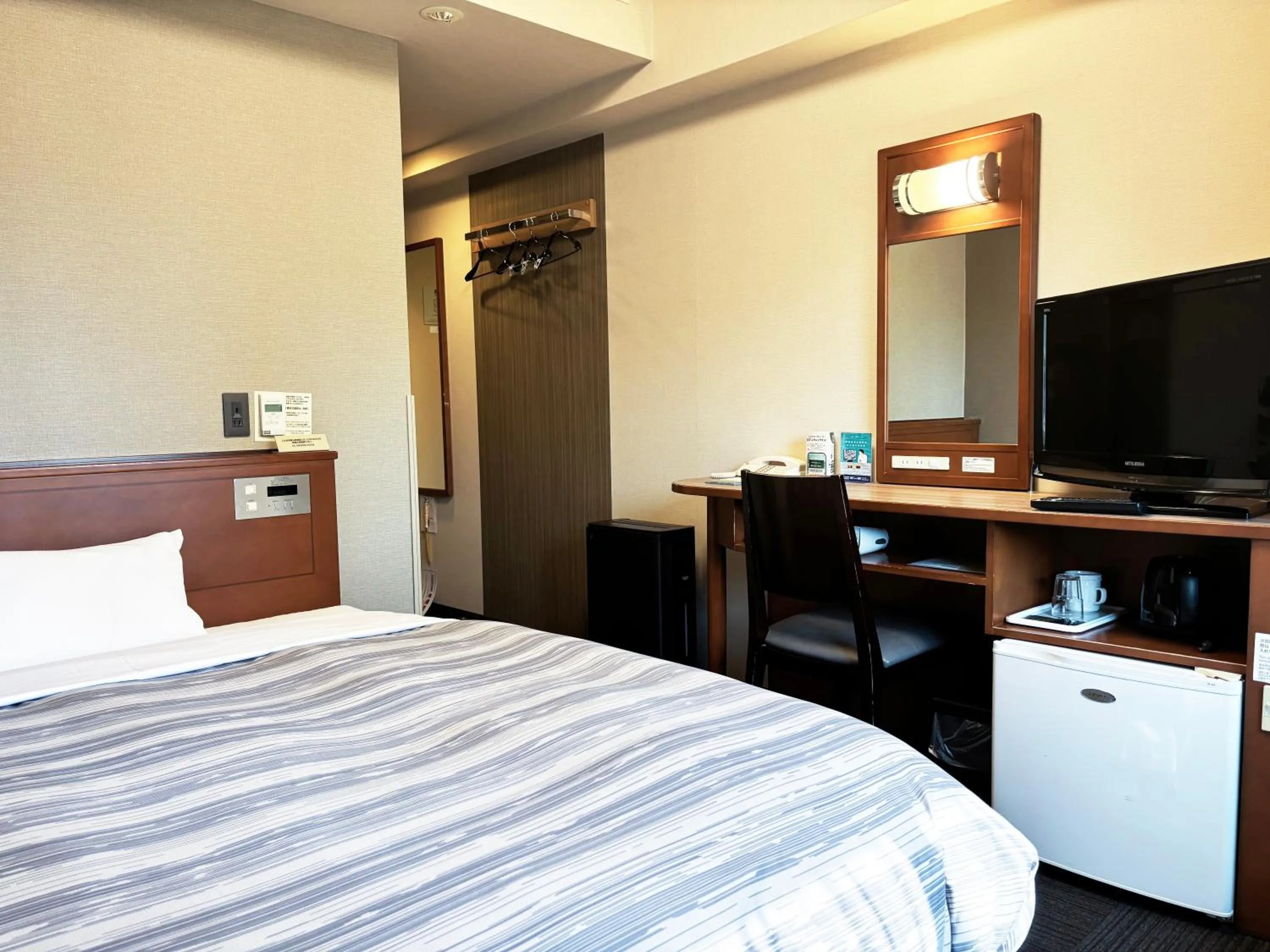 Photo of the whole room, Bed in Hotel Route-Inn Abashiri Ekimae