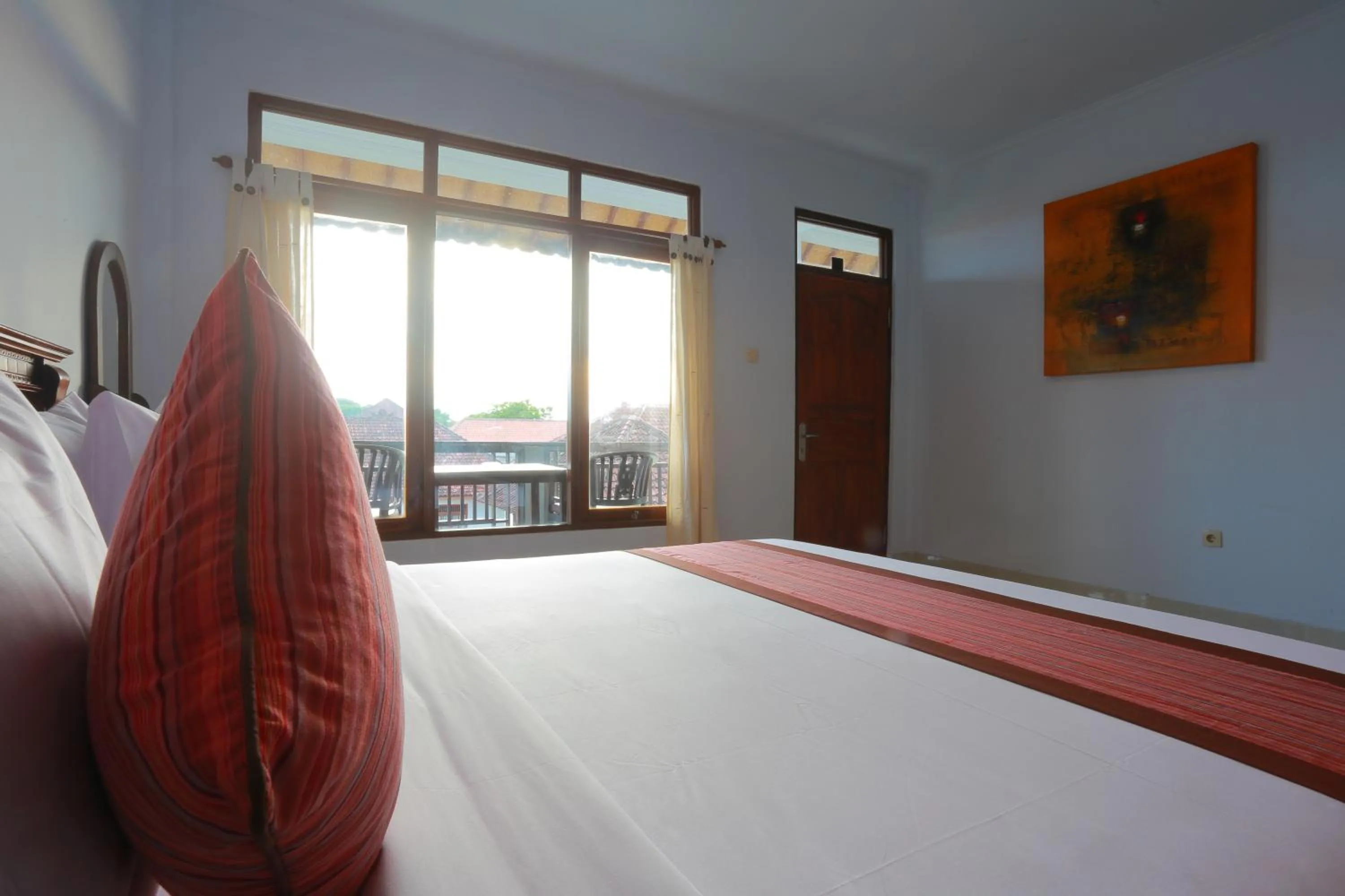 Bed in Warsa's Garden Bungalow and Spa