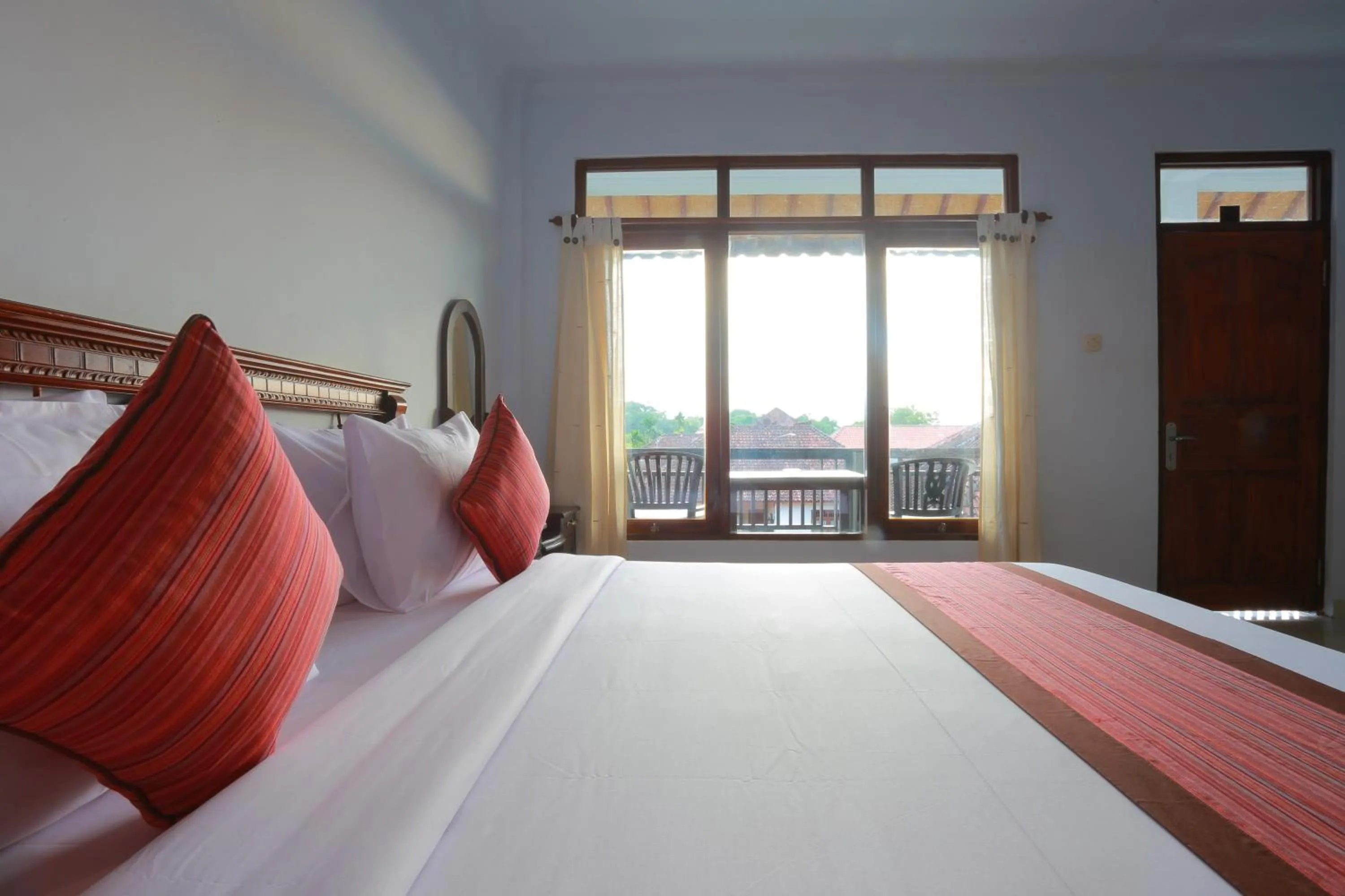 Bed in Warsa's Garden Bungalow and Spa