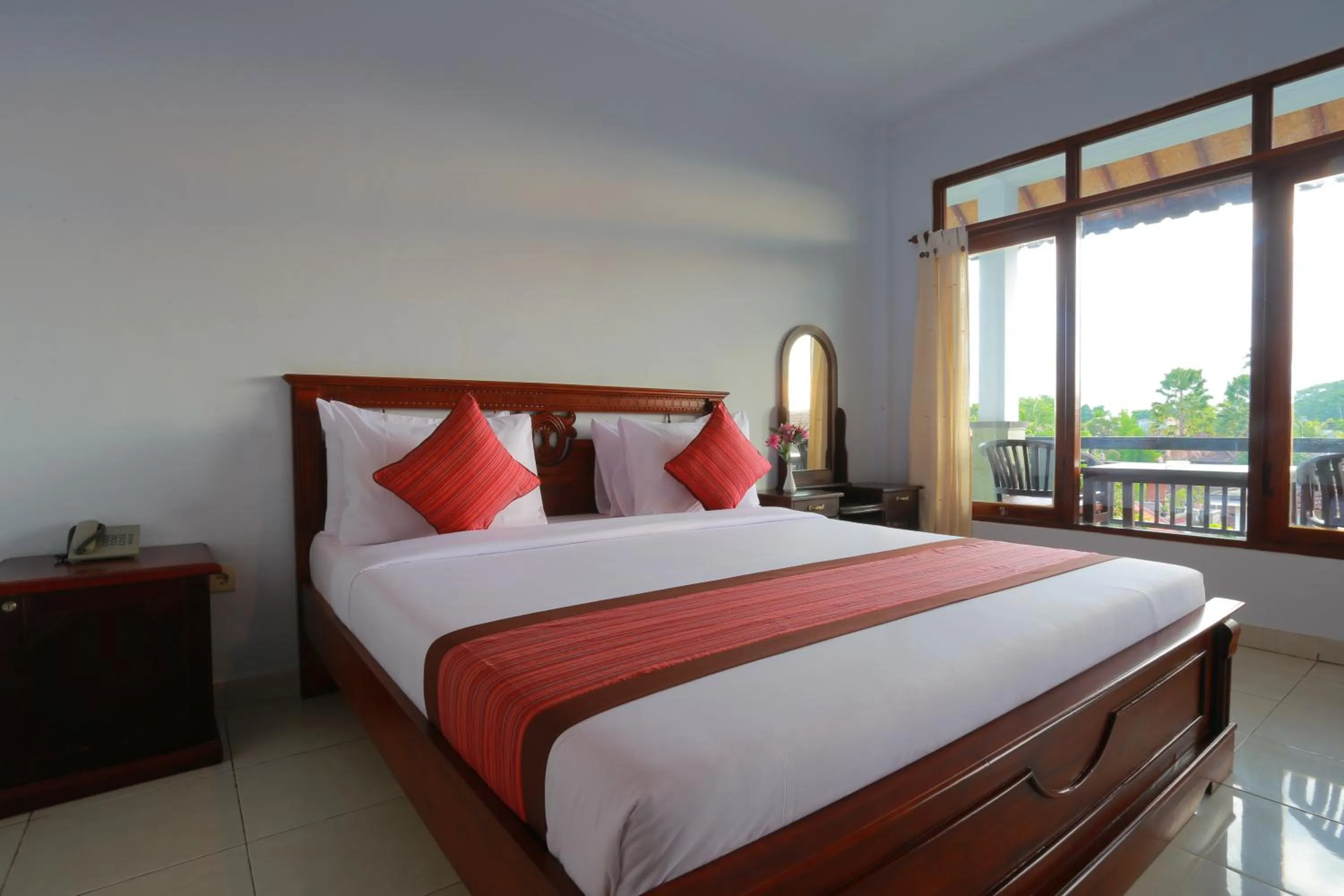 Bed in Warsa's Garden Bungalow and Spa