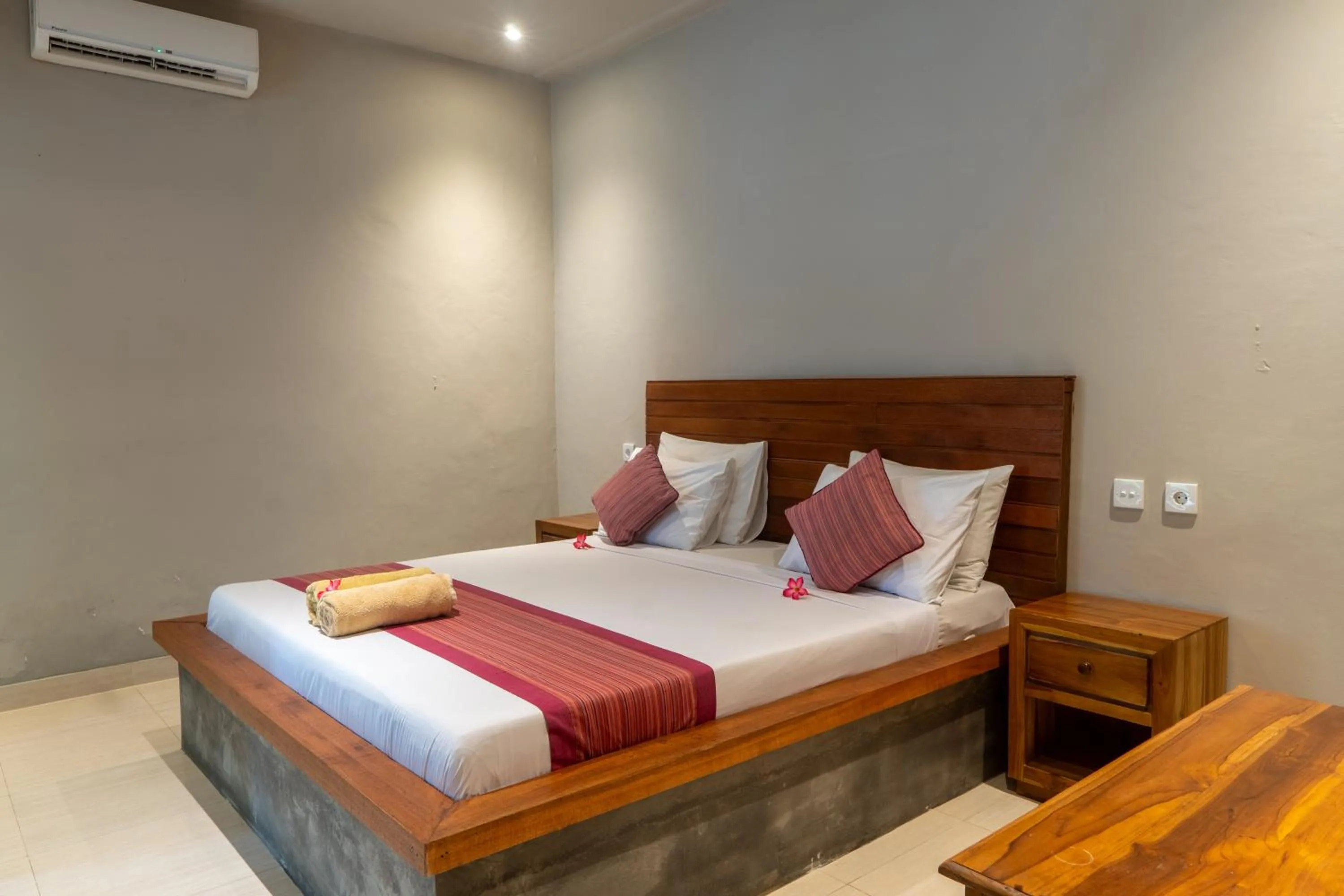 Bed in Warsa's Garden Bungalow and Spa