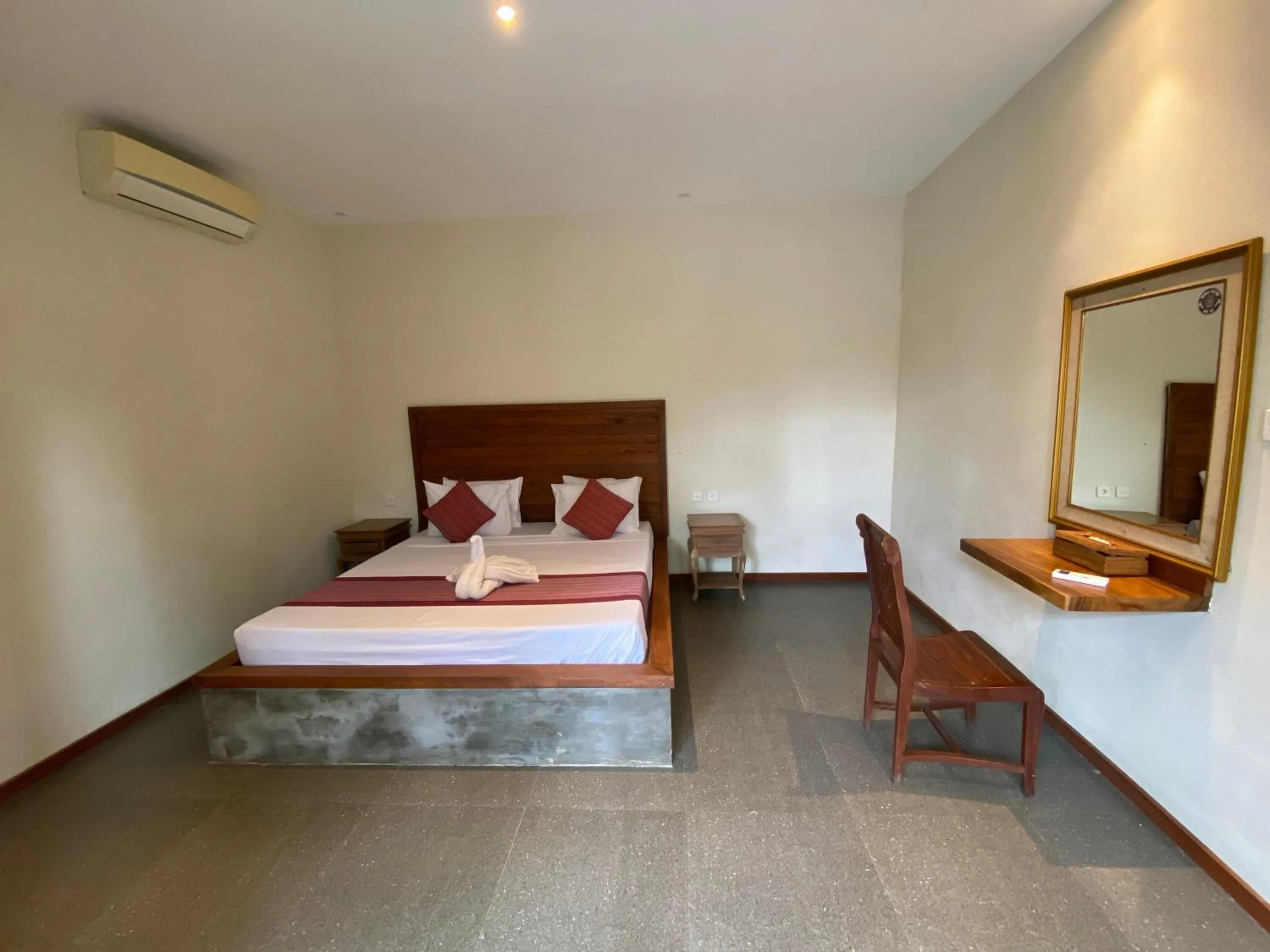 Bed in Warsa's Garden Bungalow and Spa