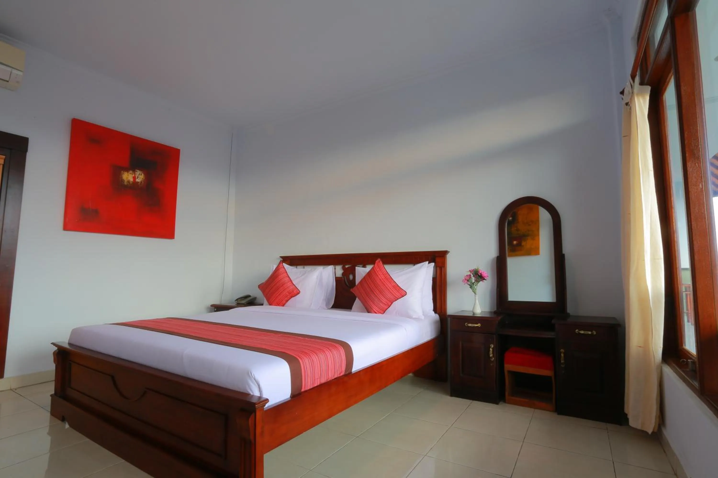 Bed in Warsa's Garden Bungalow and Spa