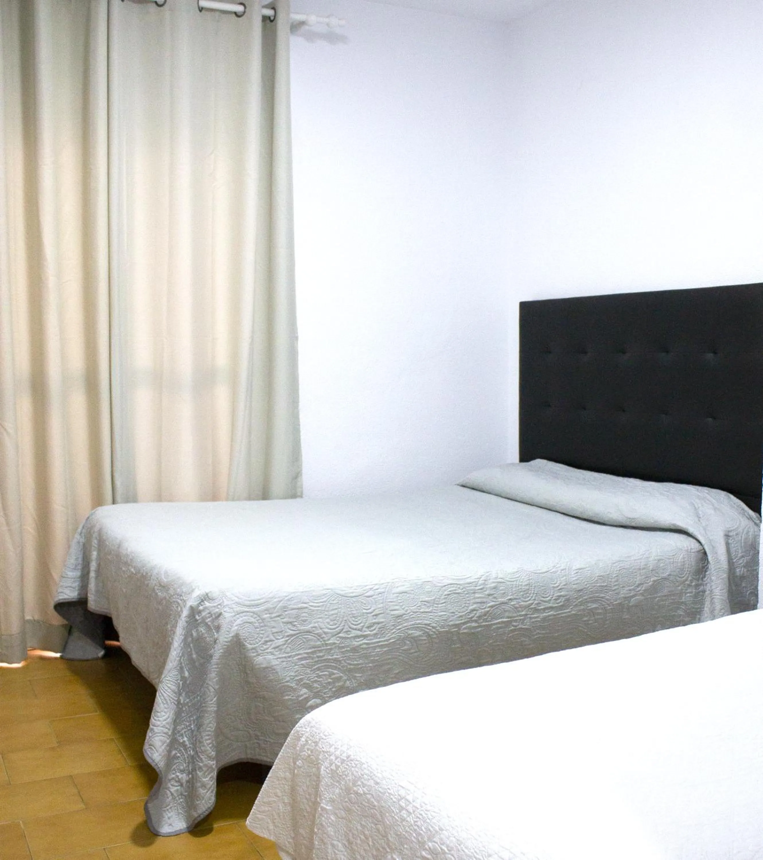 Bathroom, Bed in Hostal Villa