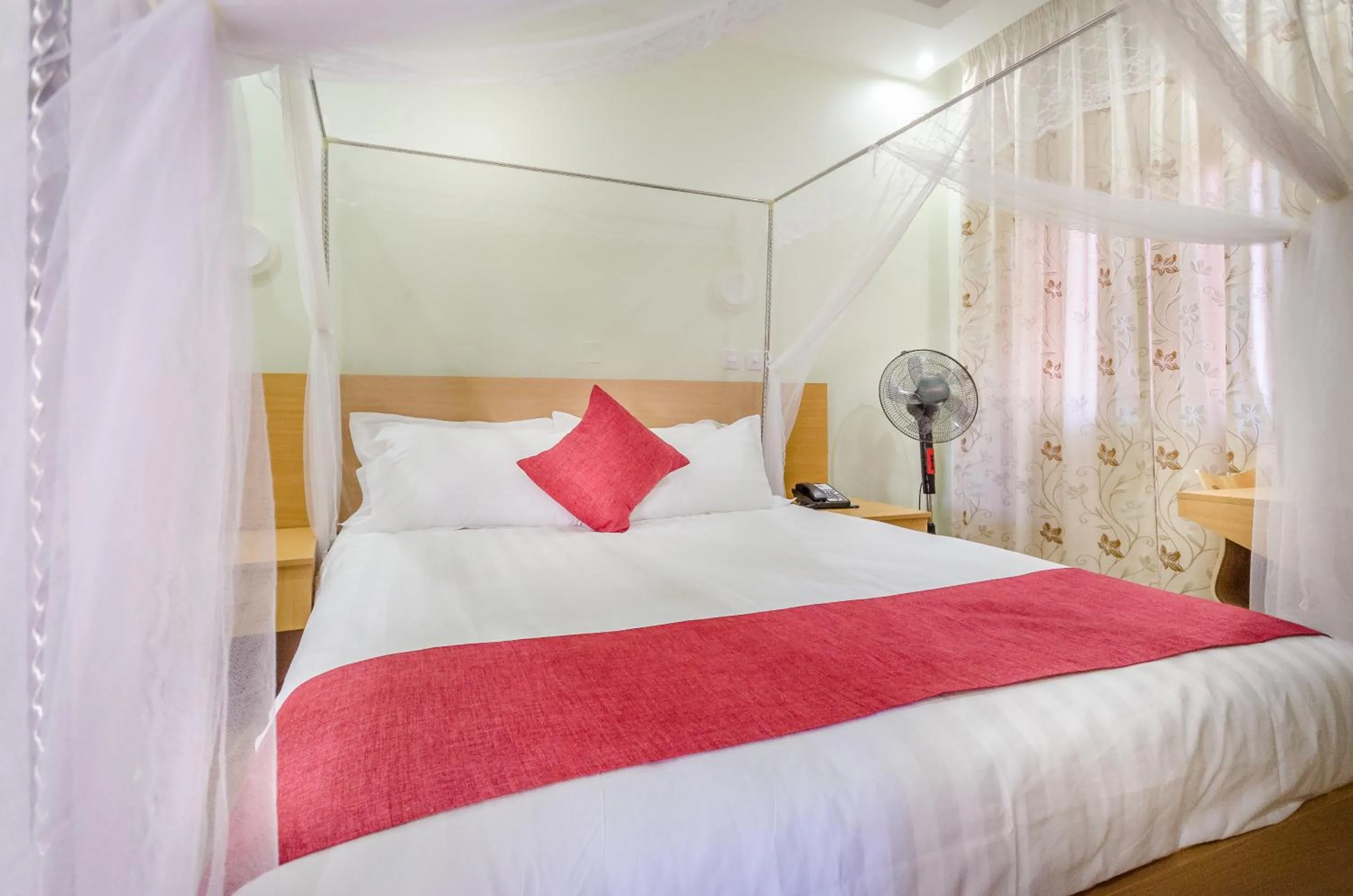 Bed in Nyumbani Hotel