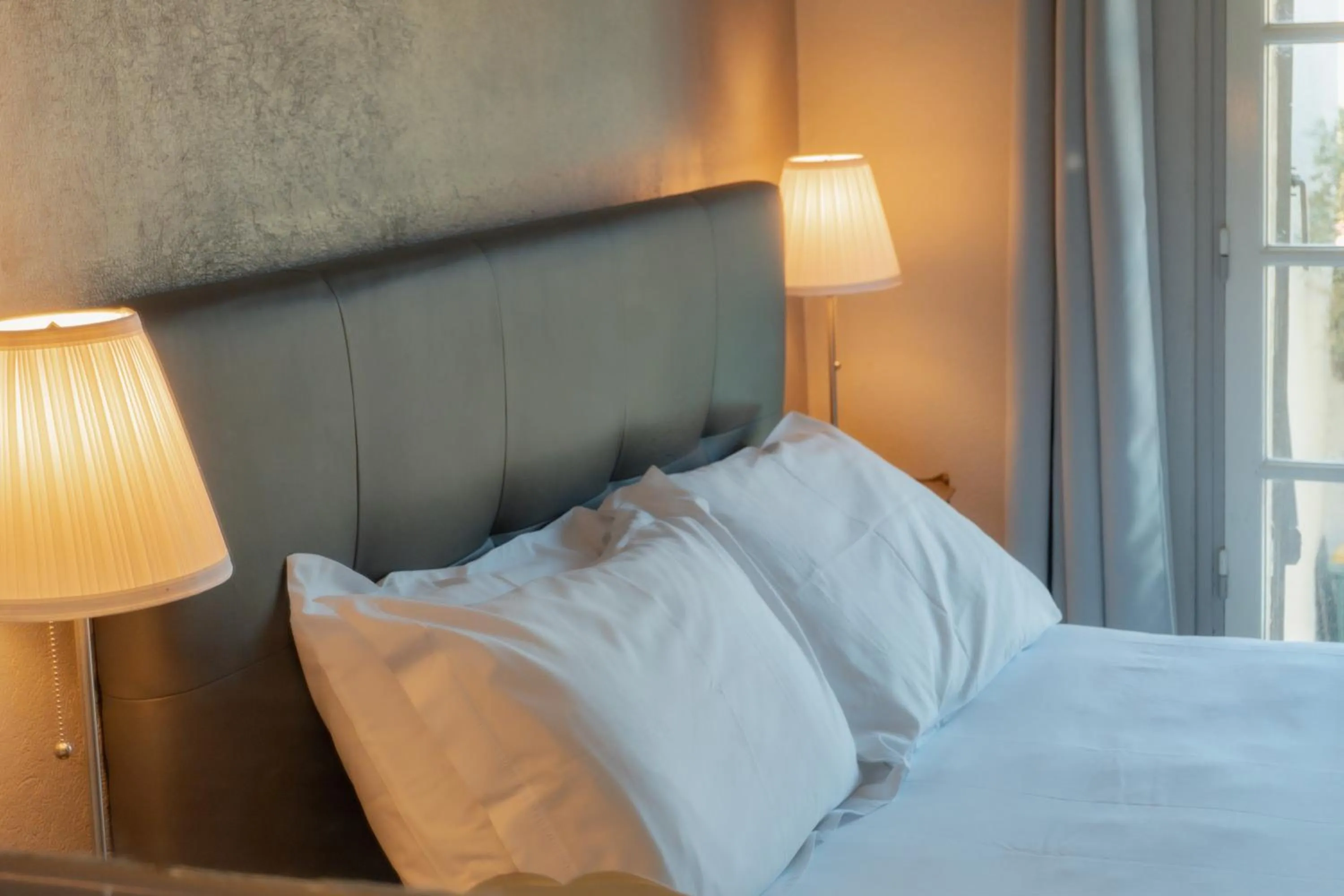 Bed in Hôtel Les Magnanarelles