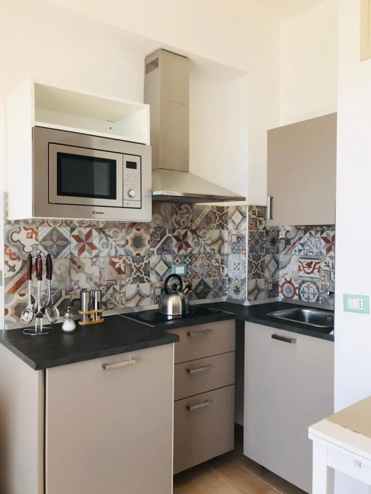 Kitchen or kitchenette in IG-Tysandros Apartments