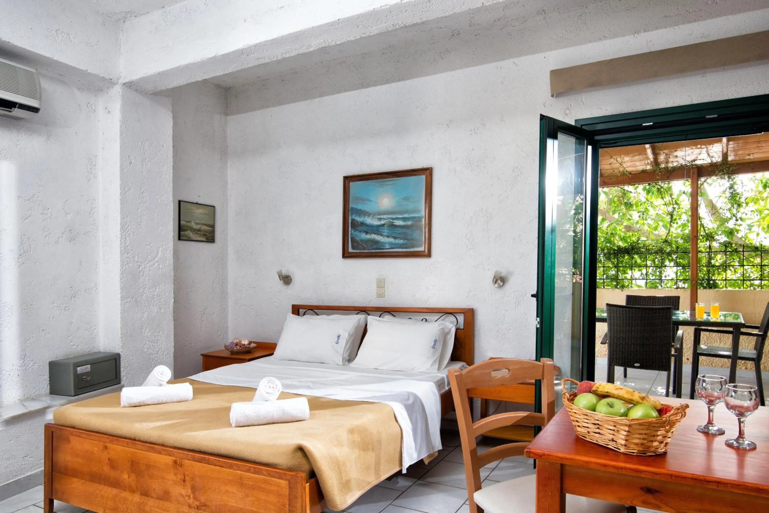 Dining area, Bed in Erofili Apartments