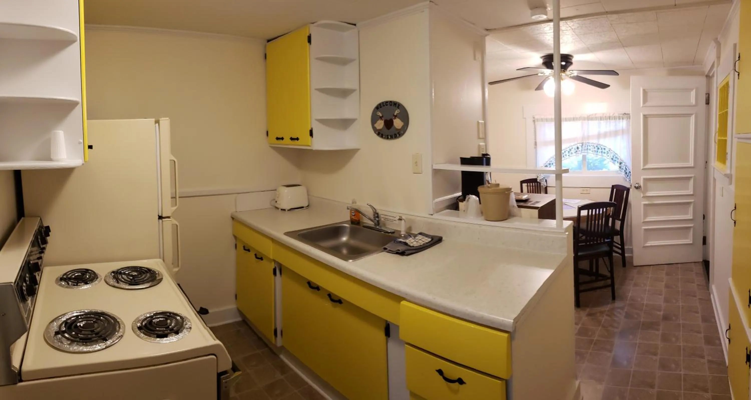 Kitchen or kitchenette in Weirs Beach Motel & Cottages