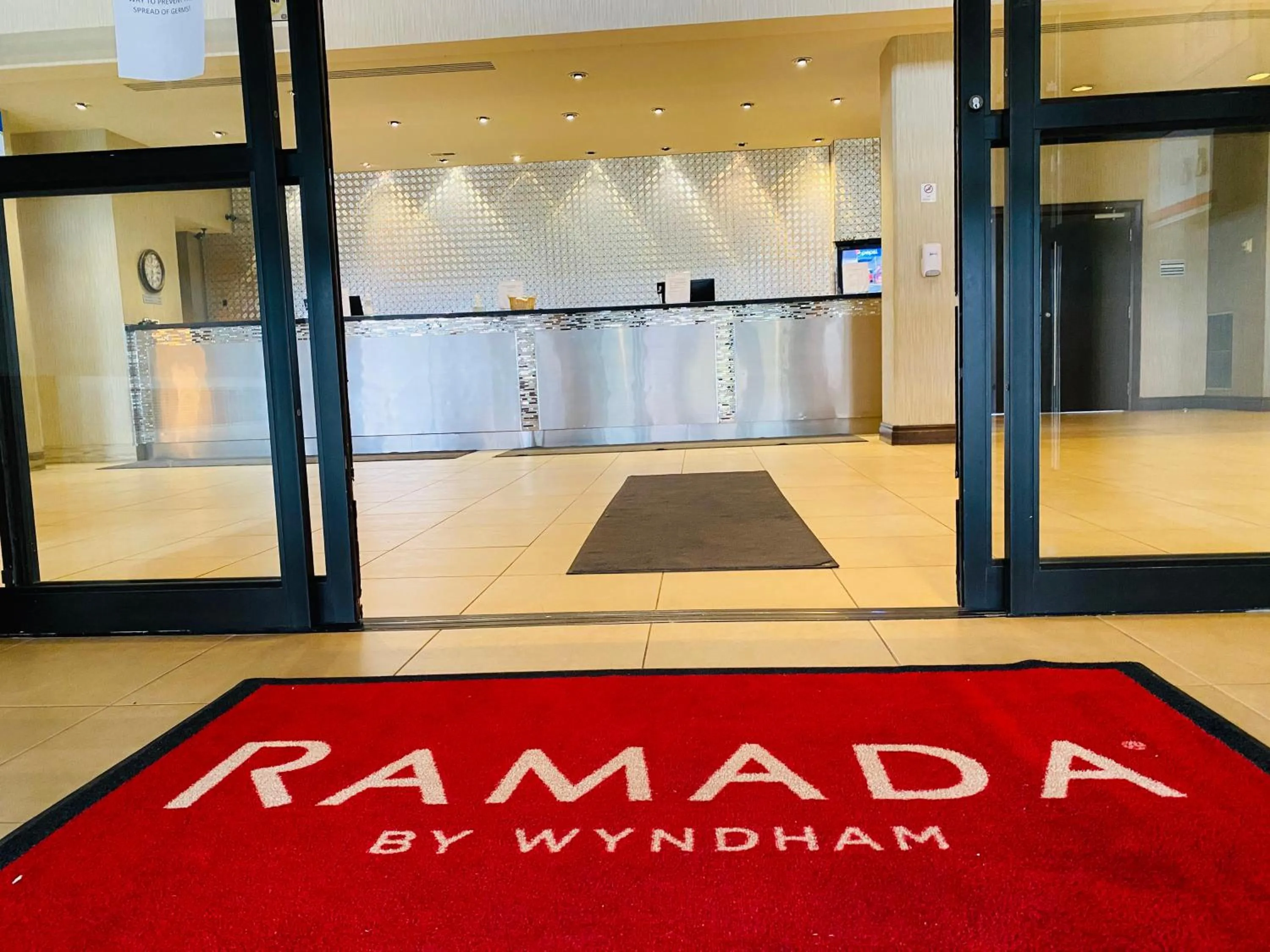 Property logo or sign in Ramada by Wyndham Belleville Harbourview Conference Center
