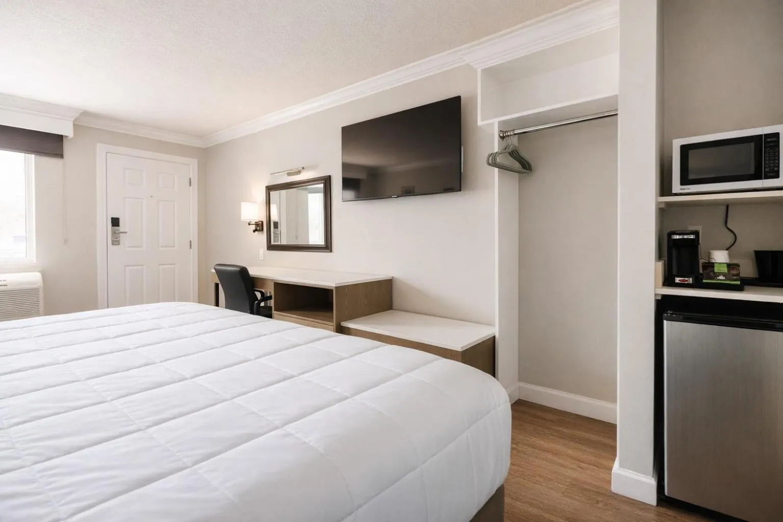 Bed in Destin Inn & Suites