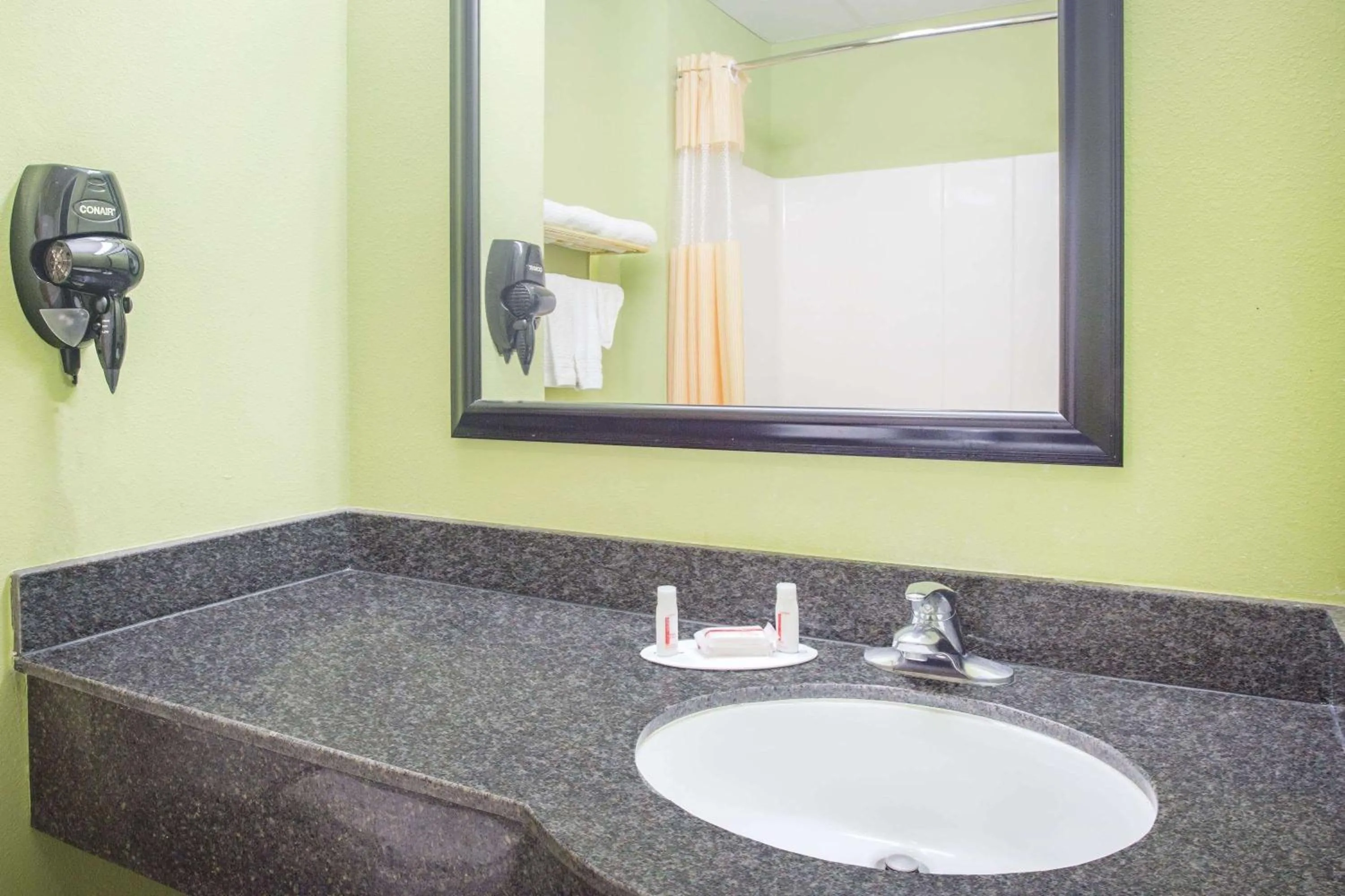 Bathroom in Days Inn & Suites by Wyndham Swainsboro
