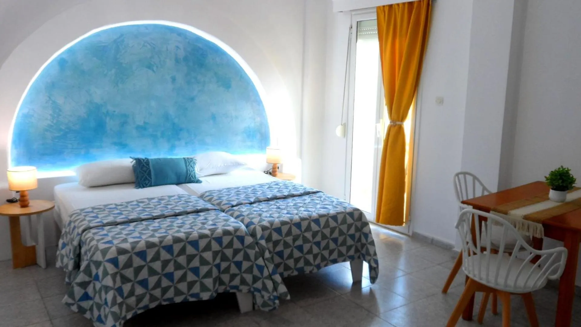 Bed in Papafotis Apartments & Suites