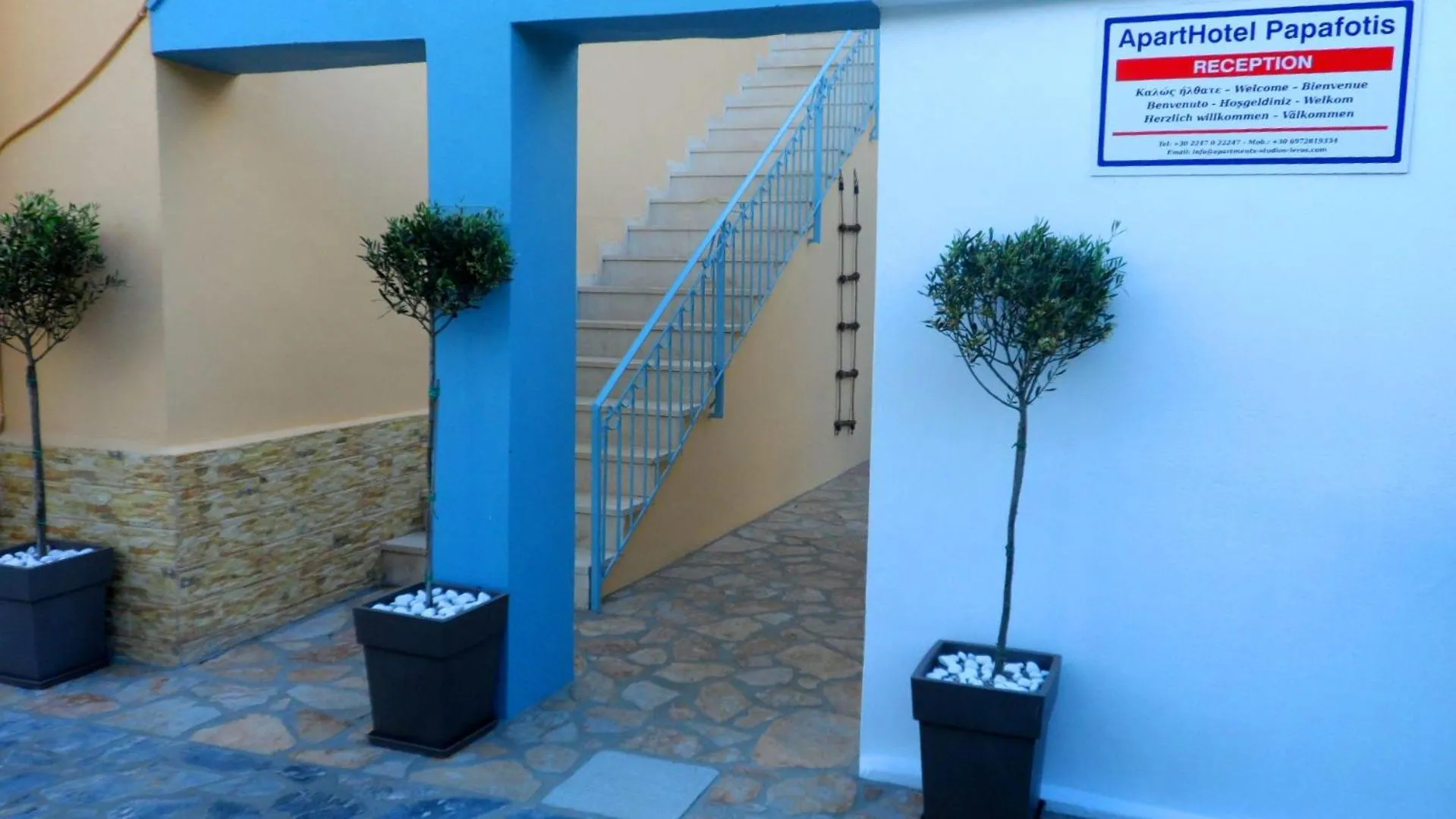 Text overlay in Papafotis Apartments & Suites