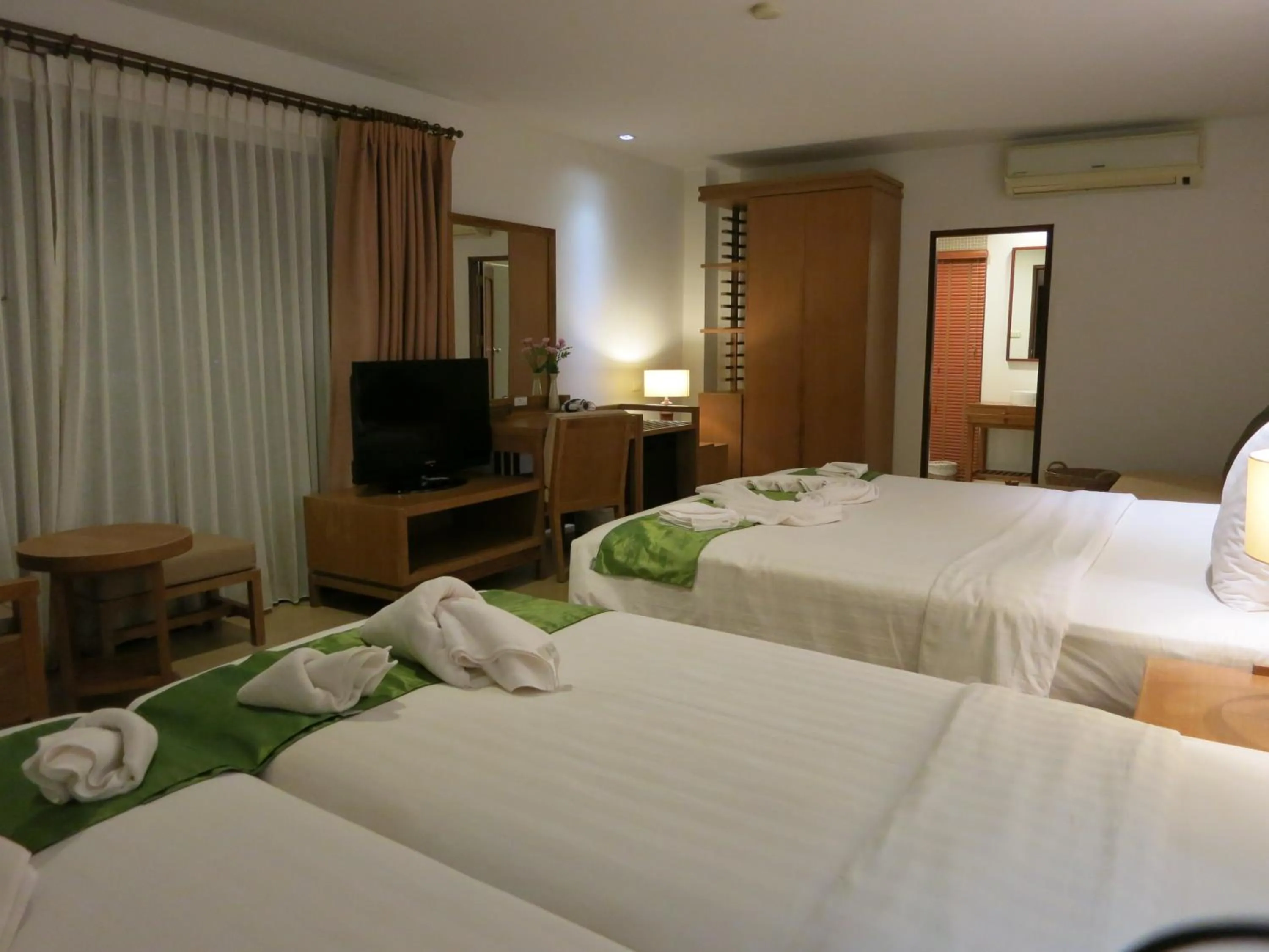 Bed in Islanda Resort Hotel