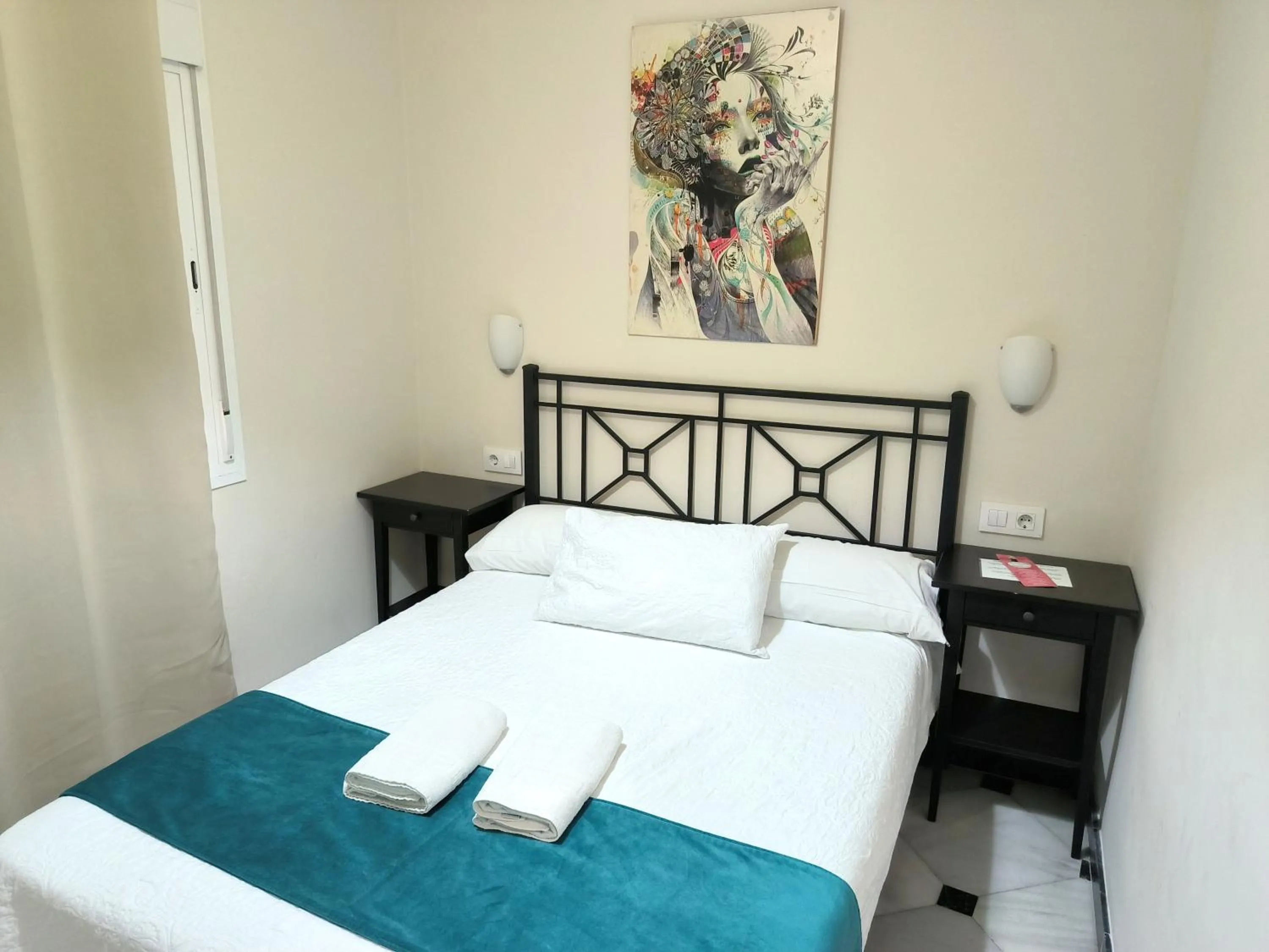 Photo of the whole room, Bed in Pension Perez Montilla