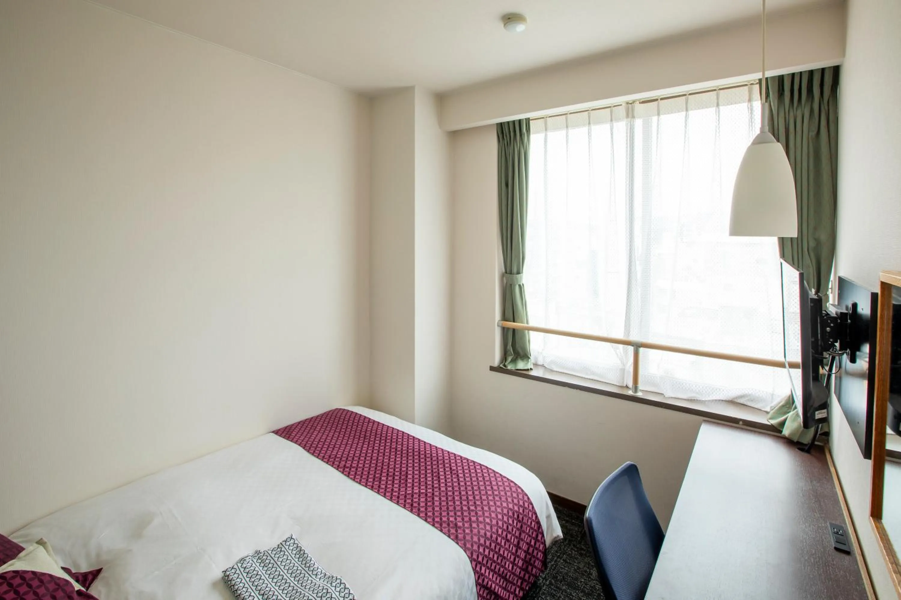 Photo of the whole room, Bed in Hotel Claire Higasa